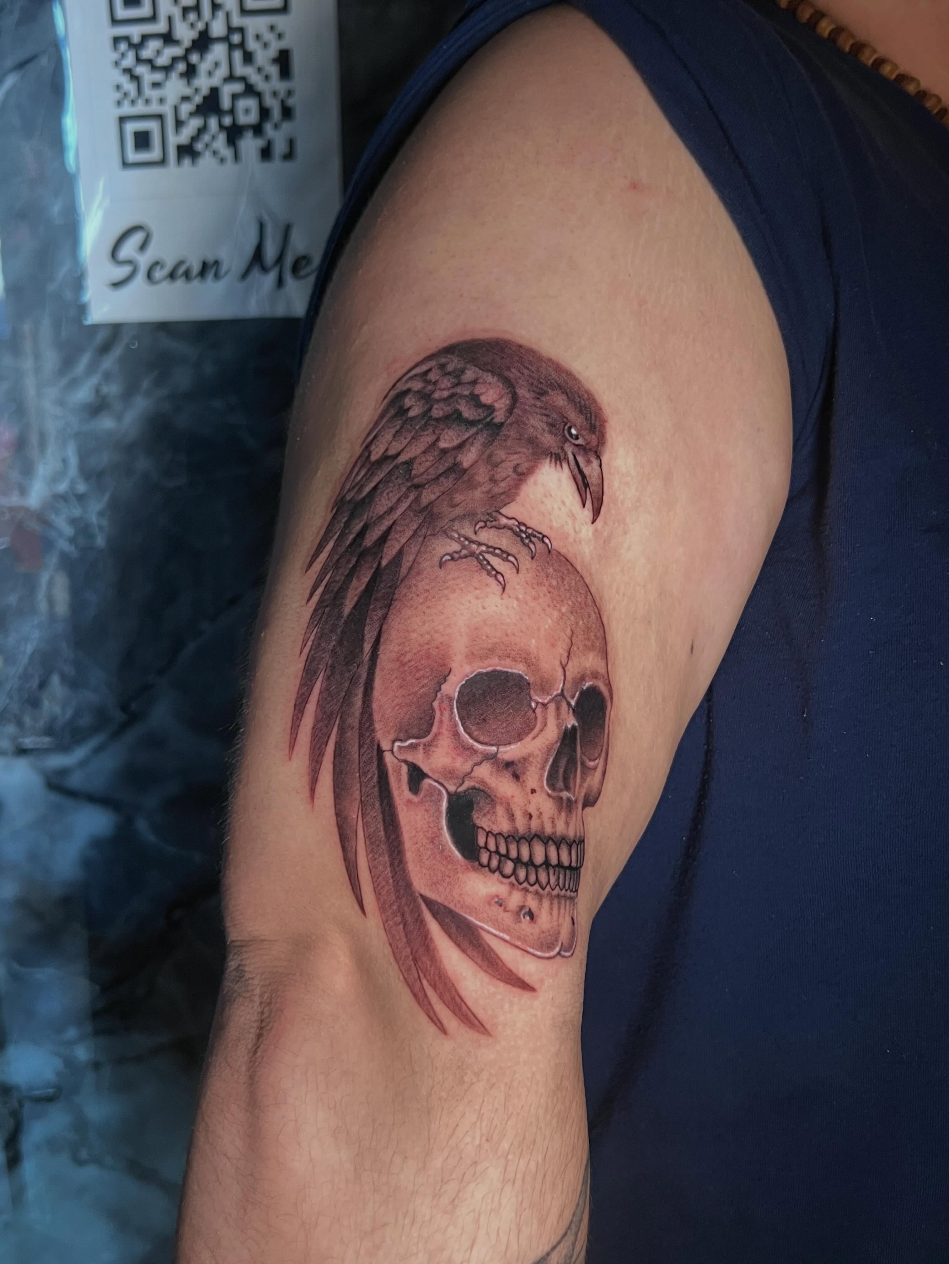 Raven on skull tattoo on the shoulder by Gerardo Galicia, New York, New York