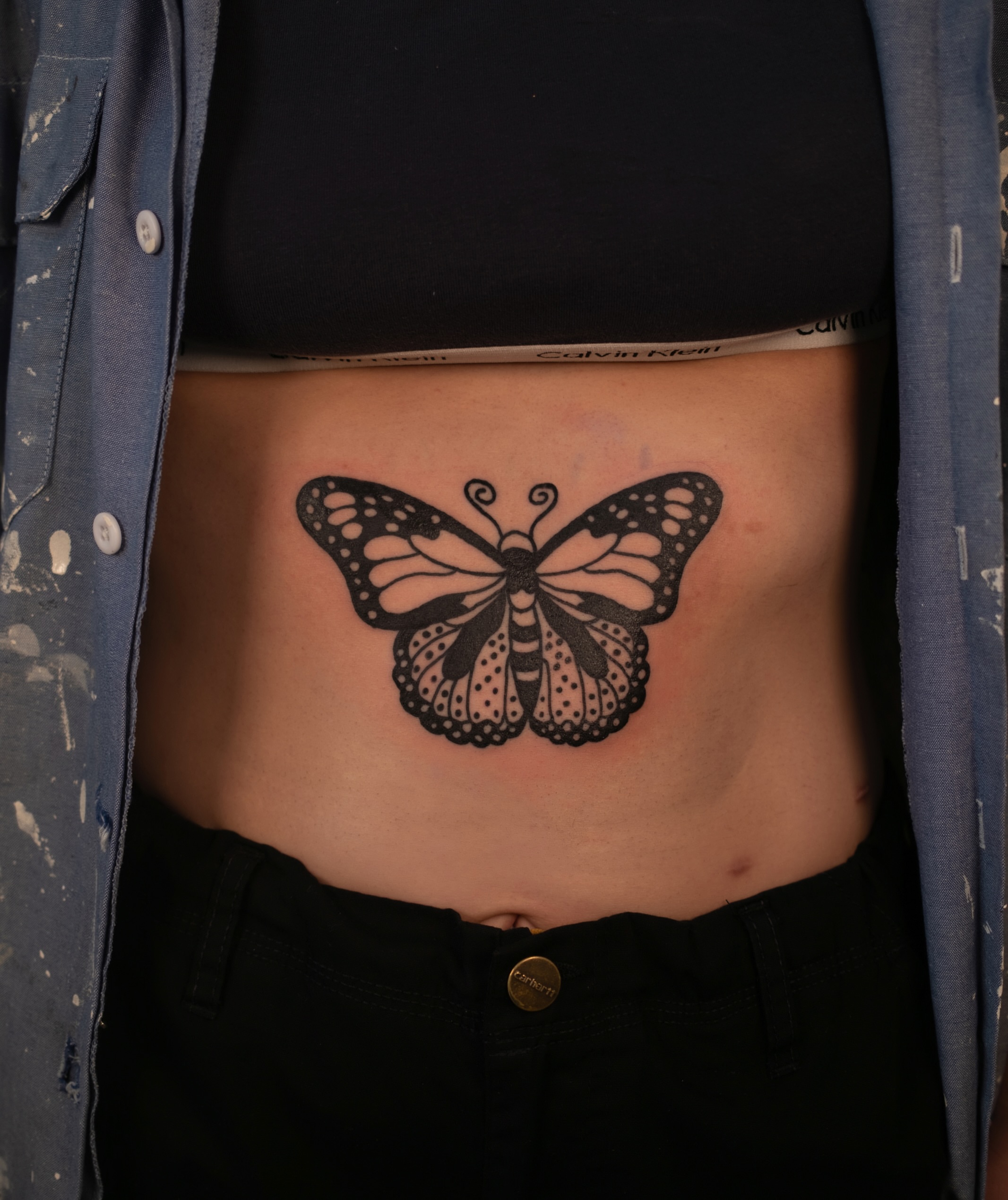 Butterfly black and grey tattoo on the torso by Neto Velasco - Sad Cat Tattoo, Austin, Texas
