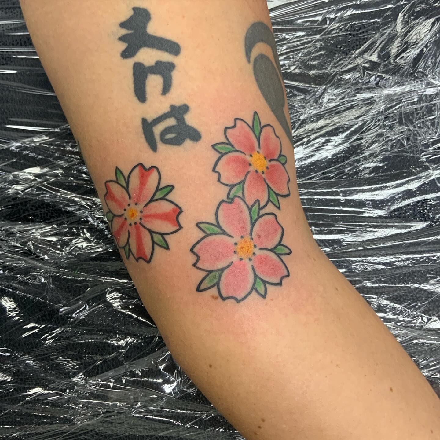 Cherry blossoms japanese irezumi tattoo on the forearm by Franky Sharpz