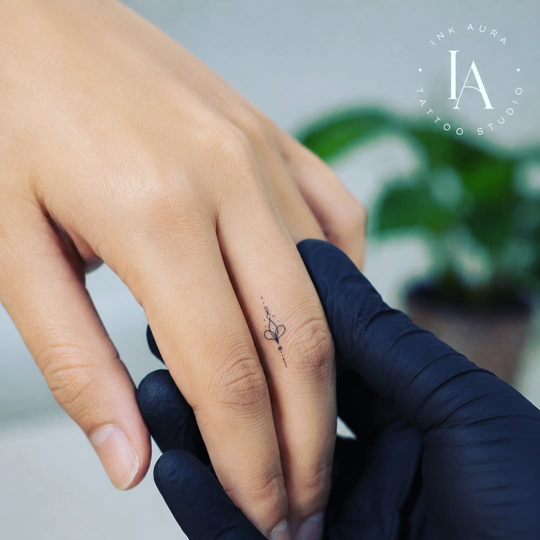 Tattoo by @ink_______aura — fine_line, minimalist