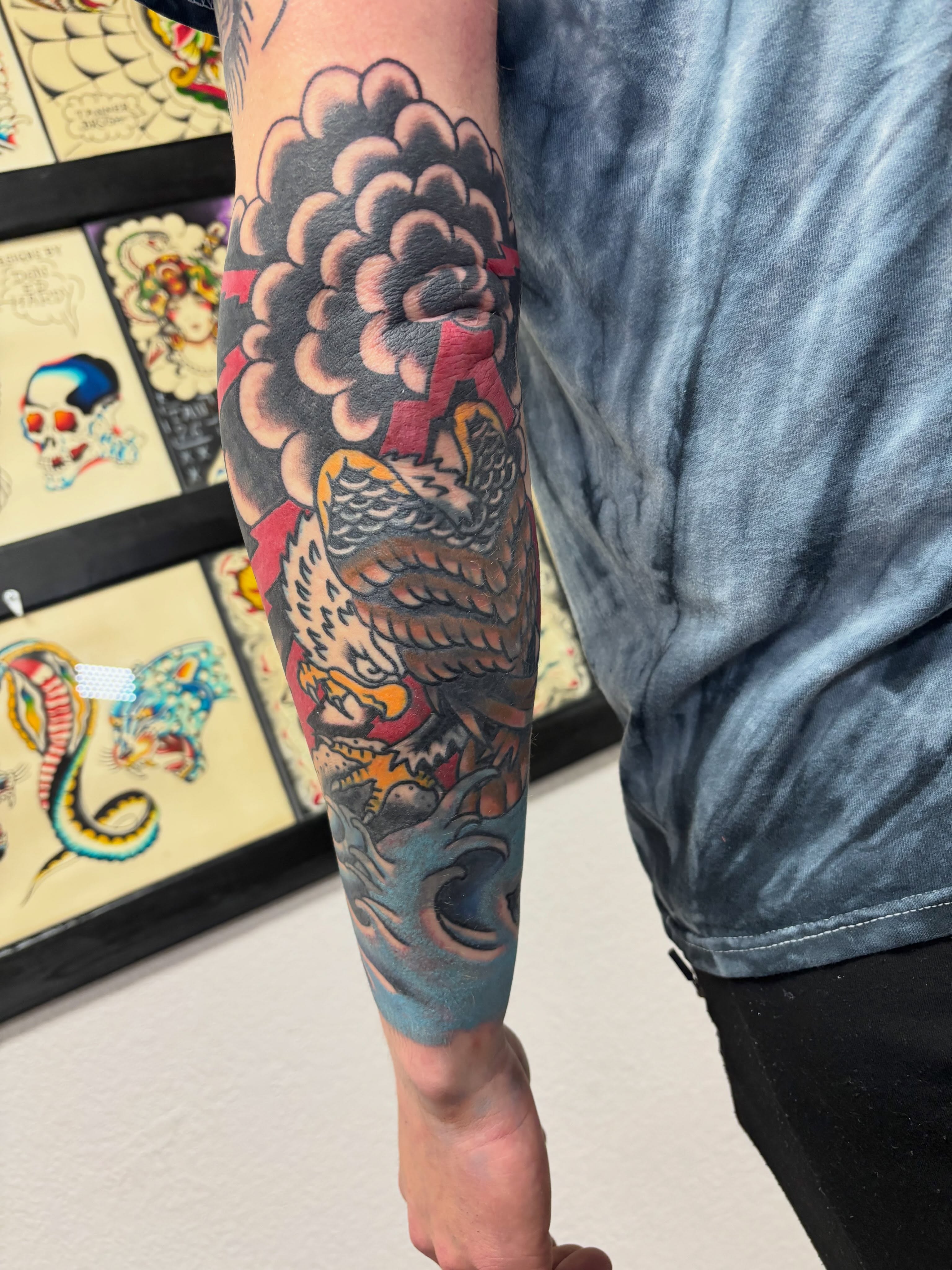 Eagle and flower American traditional tattoo on the forearm by Bold Will Hold ๐ค
