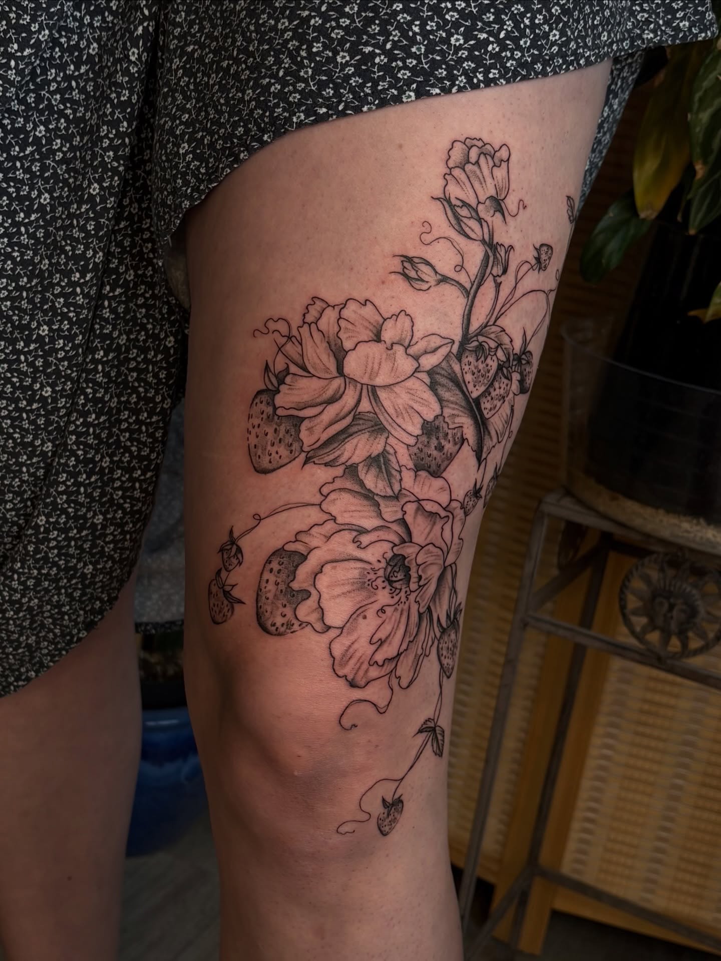 Floral arrangement black and grey tattoo on the thigh by emery ♡ slc utah tattoo artist