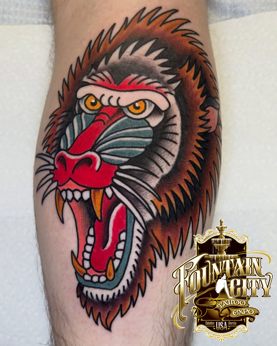 Angry monkey American traditional tattoo on the forearm by Kenneth Gibson