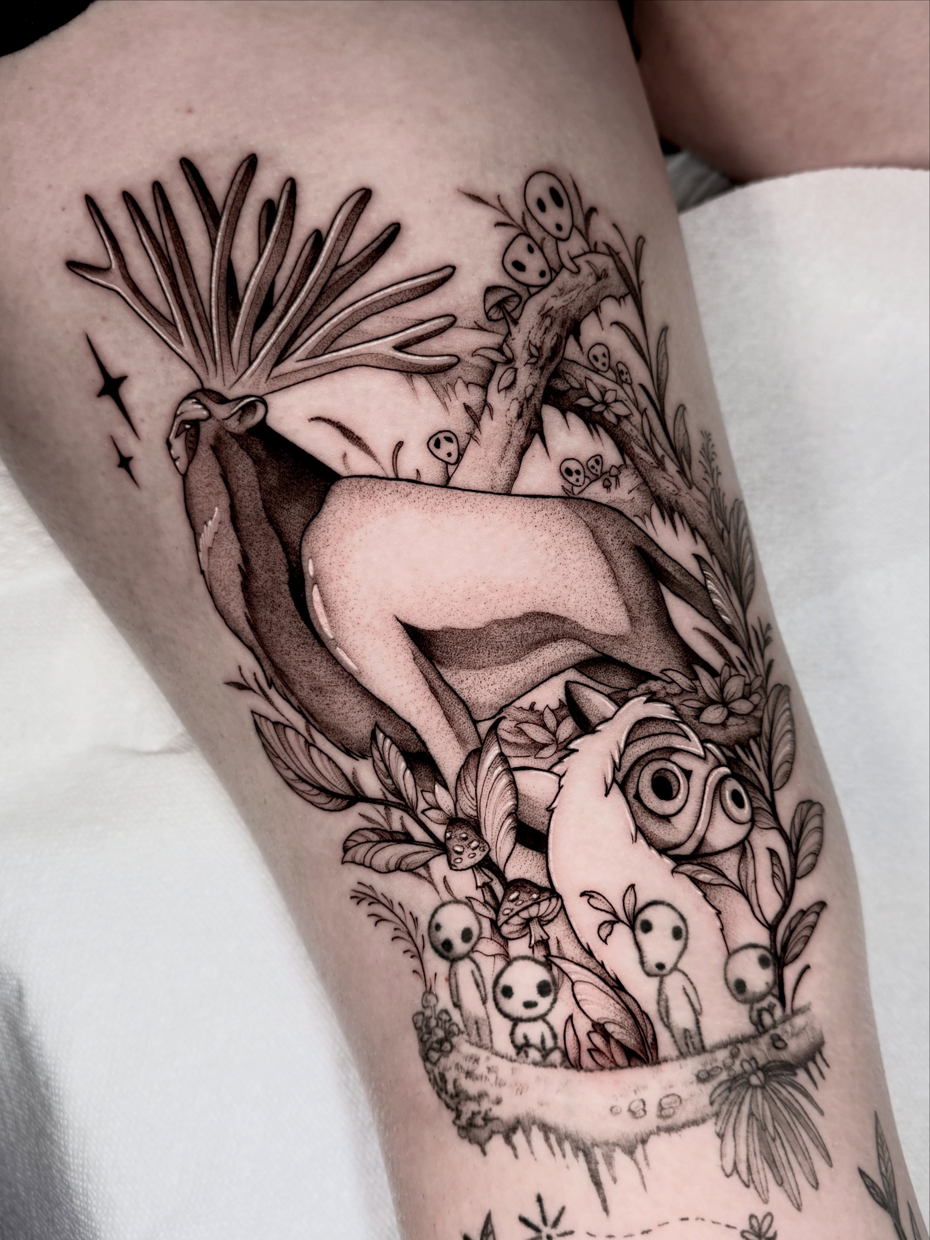 Deer and forest creatures dotwork tattoo on the forearm by Kathryn Semus