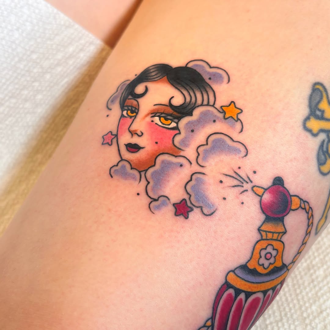 Moon and rocket American traditional tattoo on the forearm by Caeli Martin