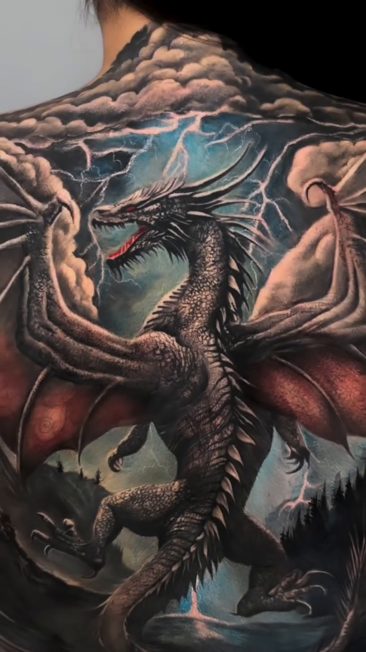 Dragon in a stormy landscape Japanese tattoo on the back by ✨ Tattoo Artist
