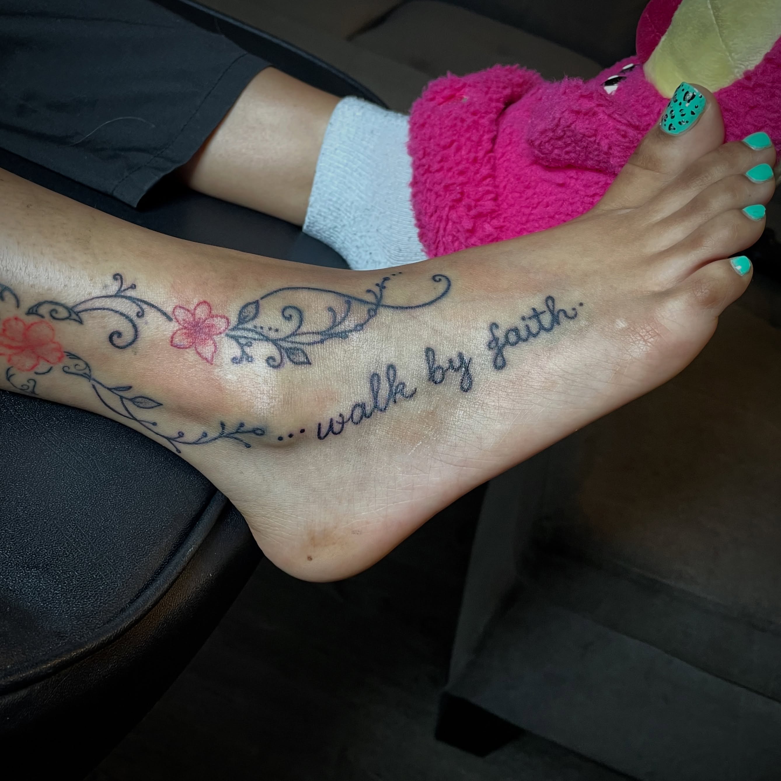 Walk by faith lettering script tattoo on the foot by The Reelist Ink