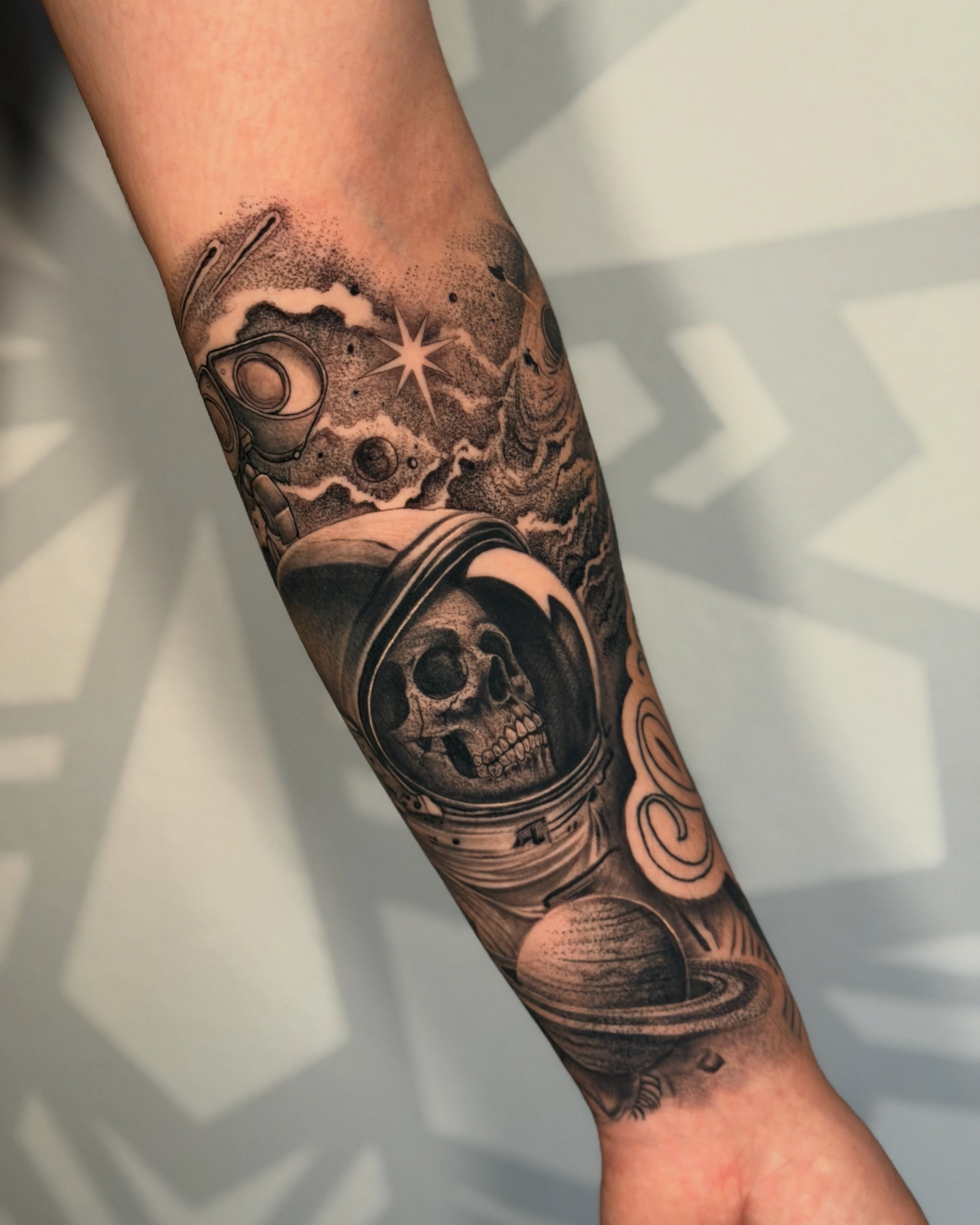 Astronaut skull dotwork tattoo on the forearm by Las Vegas Tattoo Artist