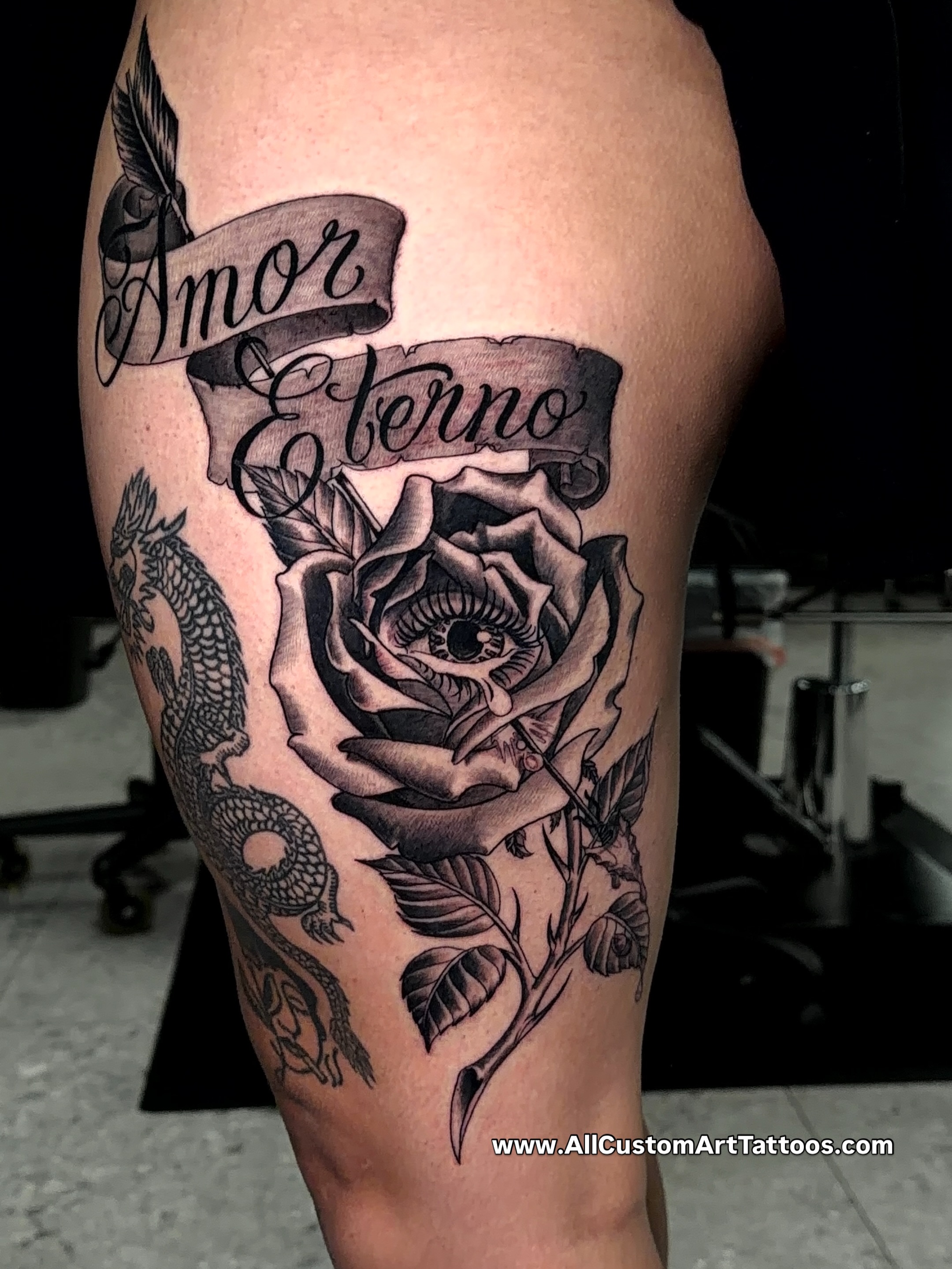 Rose with eye realism tattoo on the thigh by Rafael Marte, White Plains, New York