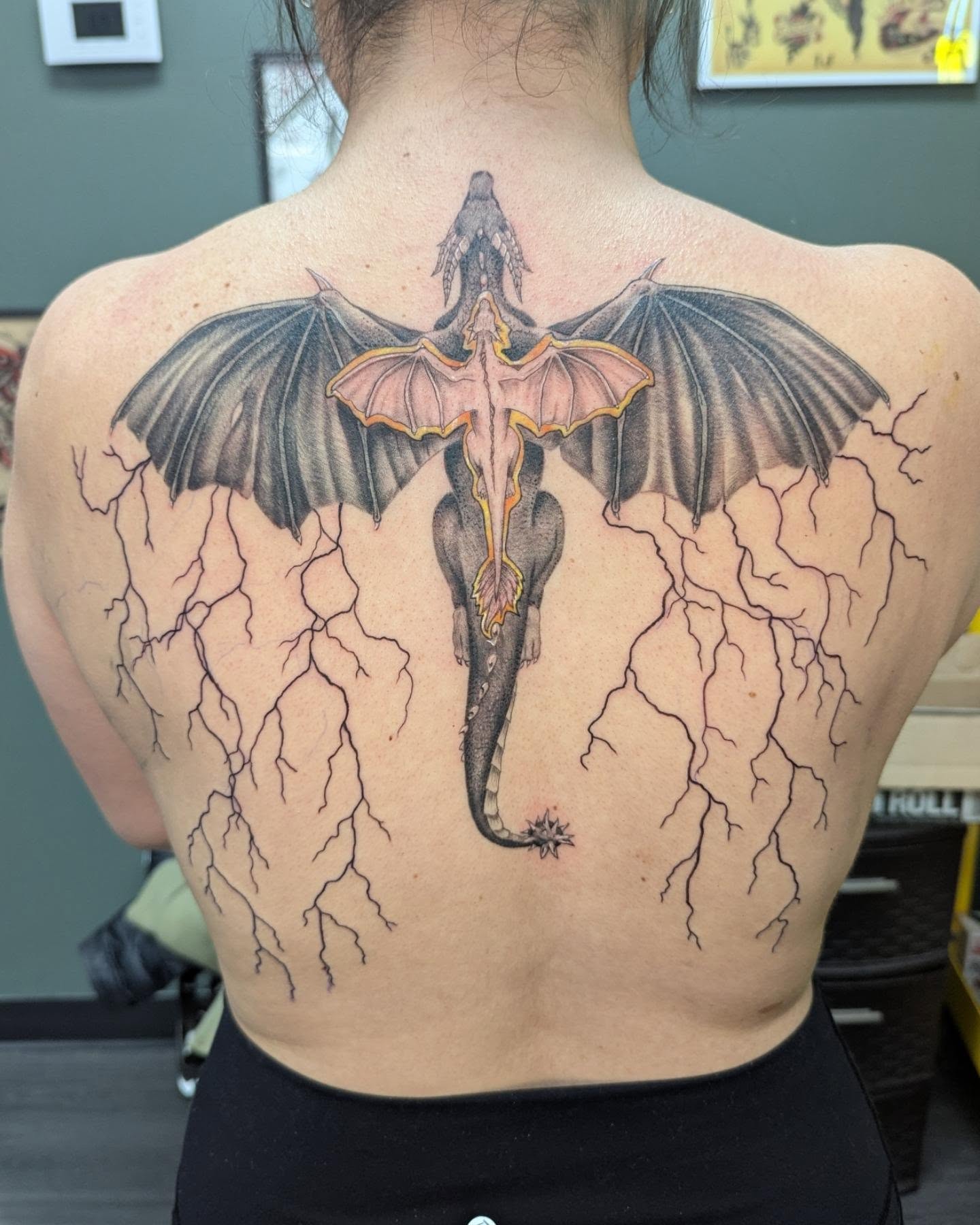 Elephant with wings dark realism tattoo on the back by Hannah Hayes, Livonia, Michigan