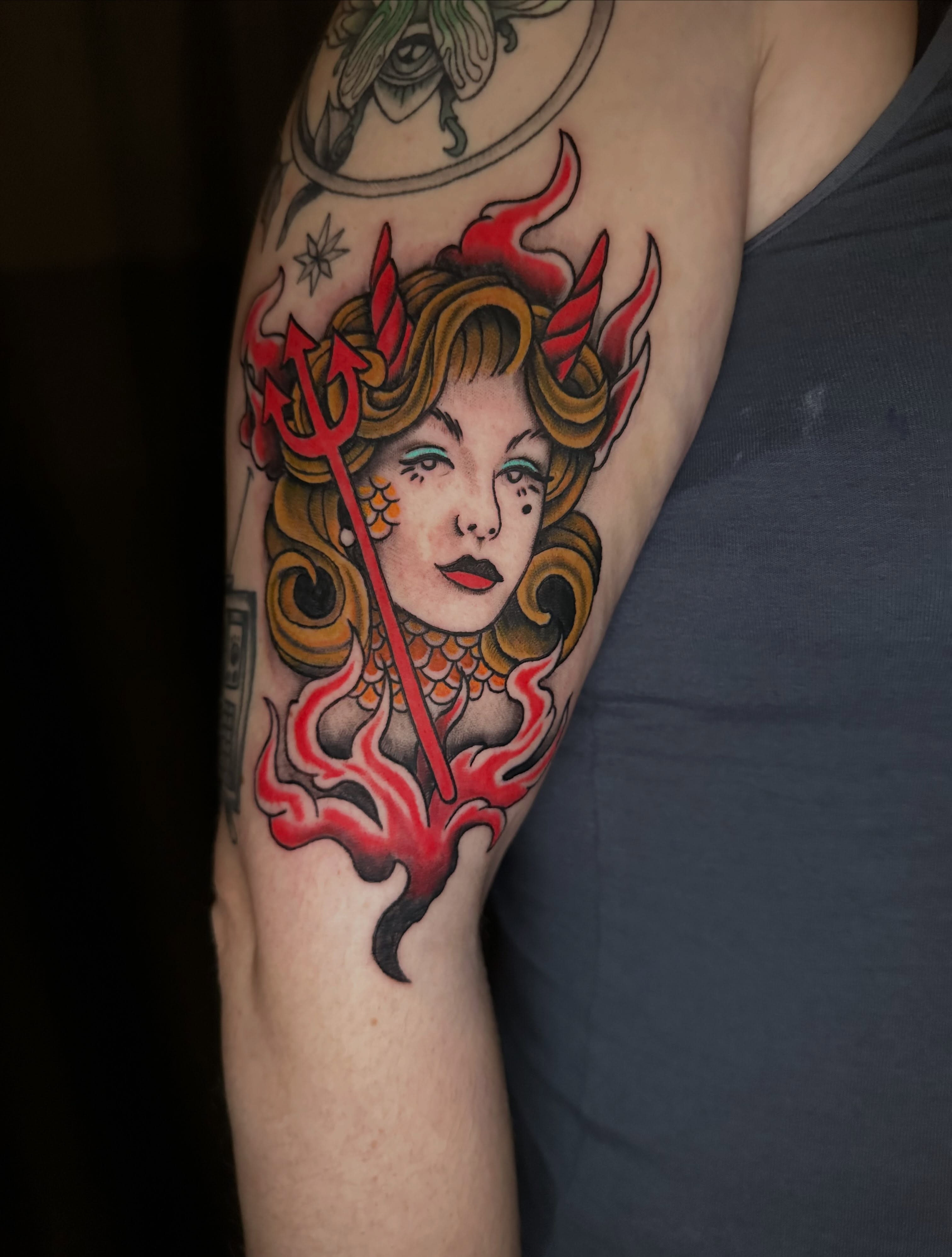 Woman with horns American traditional tattoo on the forearm by Lindsey Bendsey