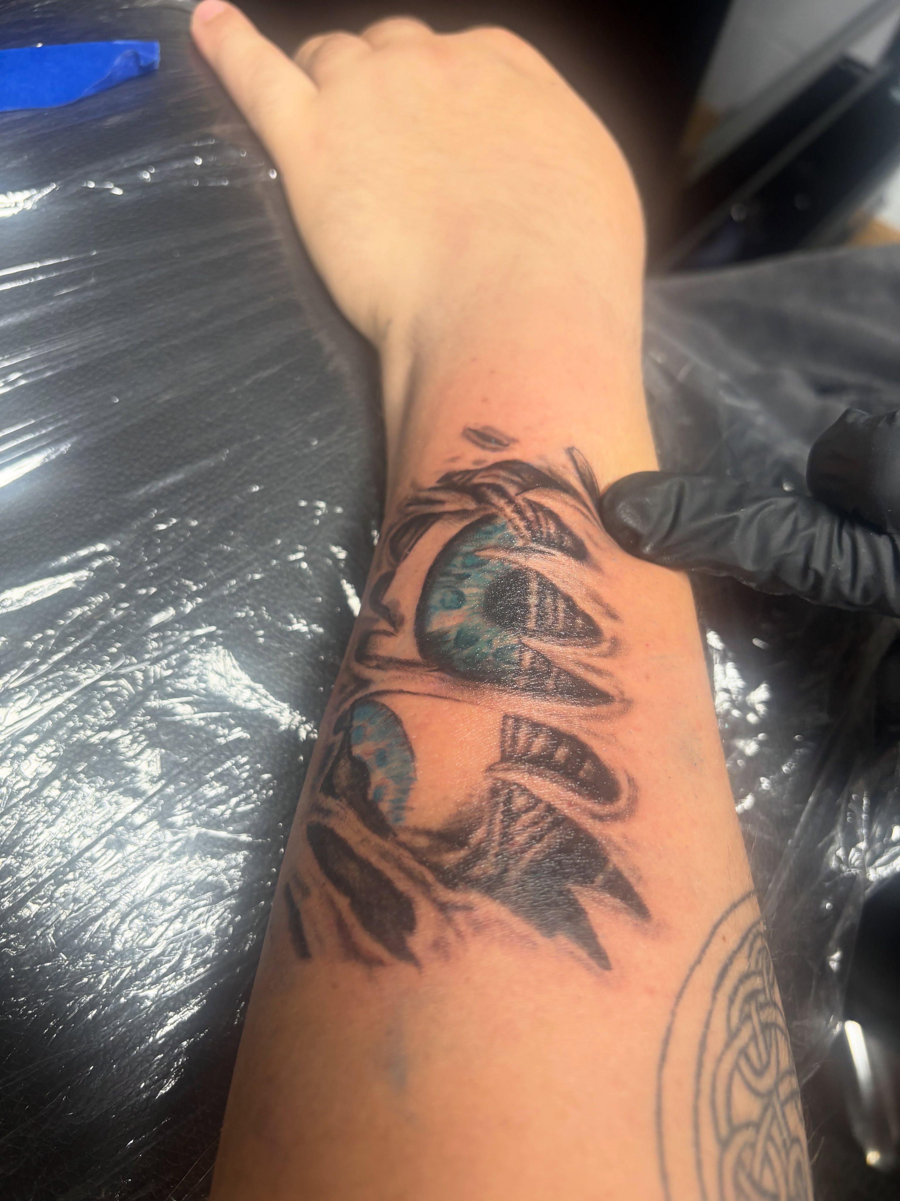 Abstract design black and grey tattoo on the forearm by Alexander Haber