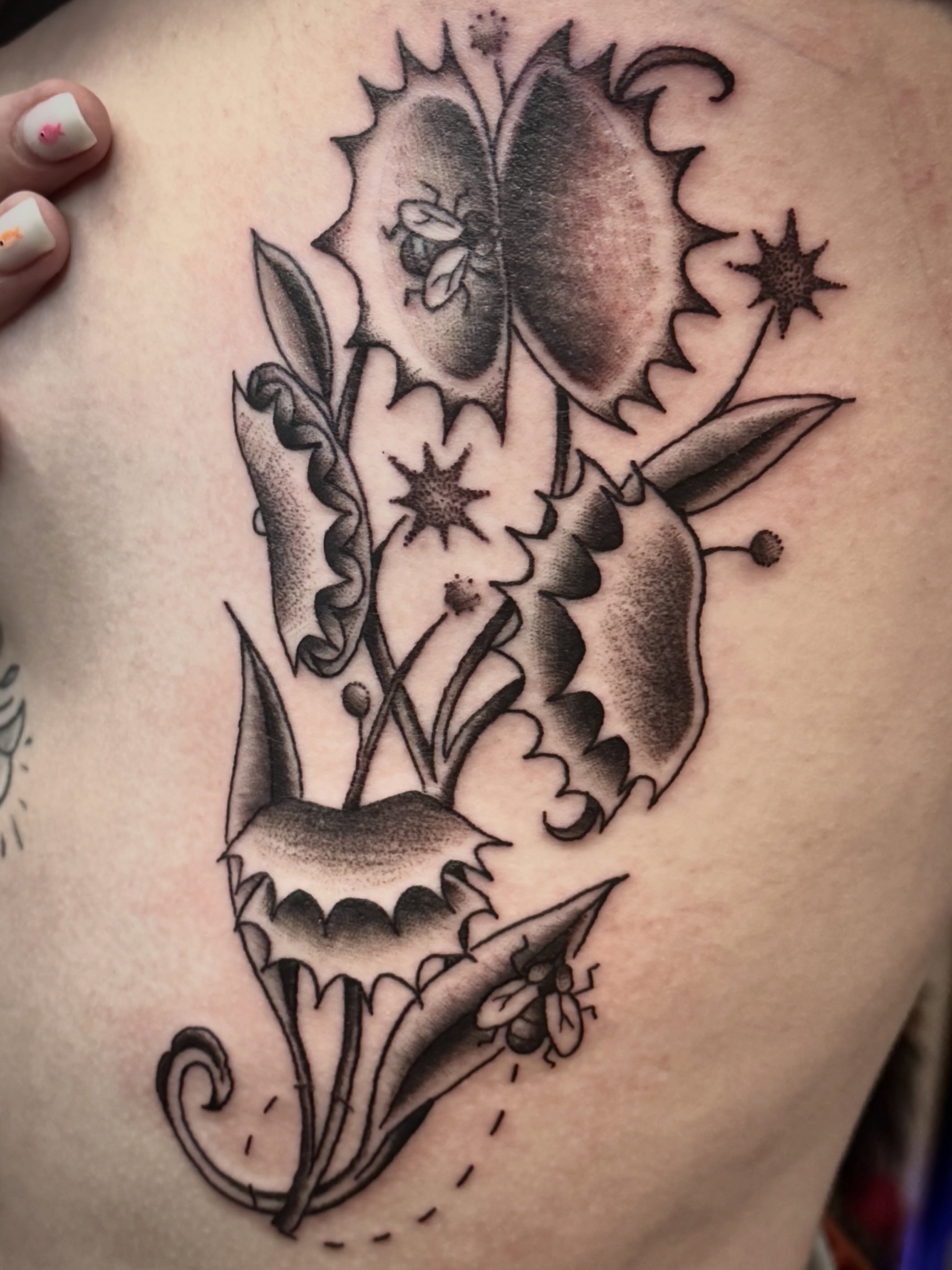 Floral arrangement black and grey tattoo on the shoulder by Luisa Gonzalez, Austin, Texas