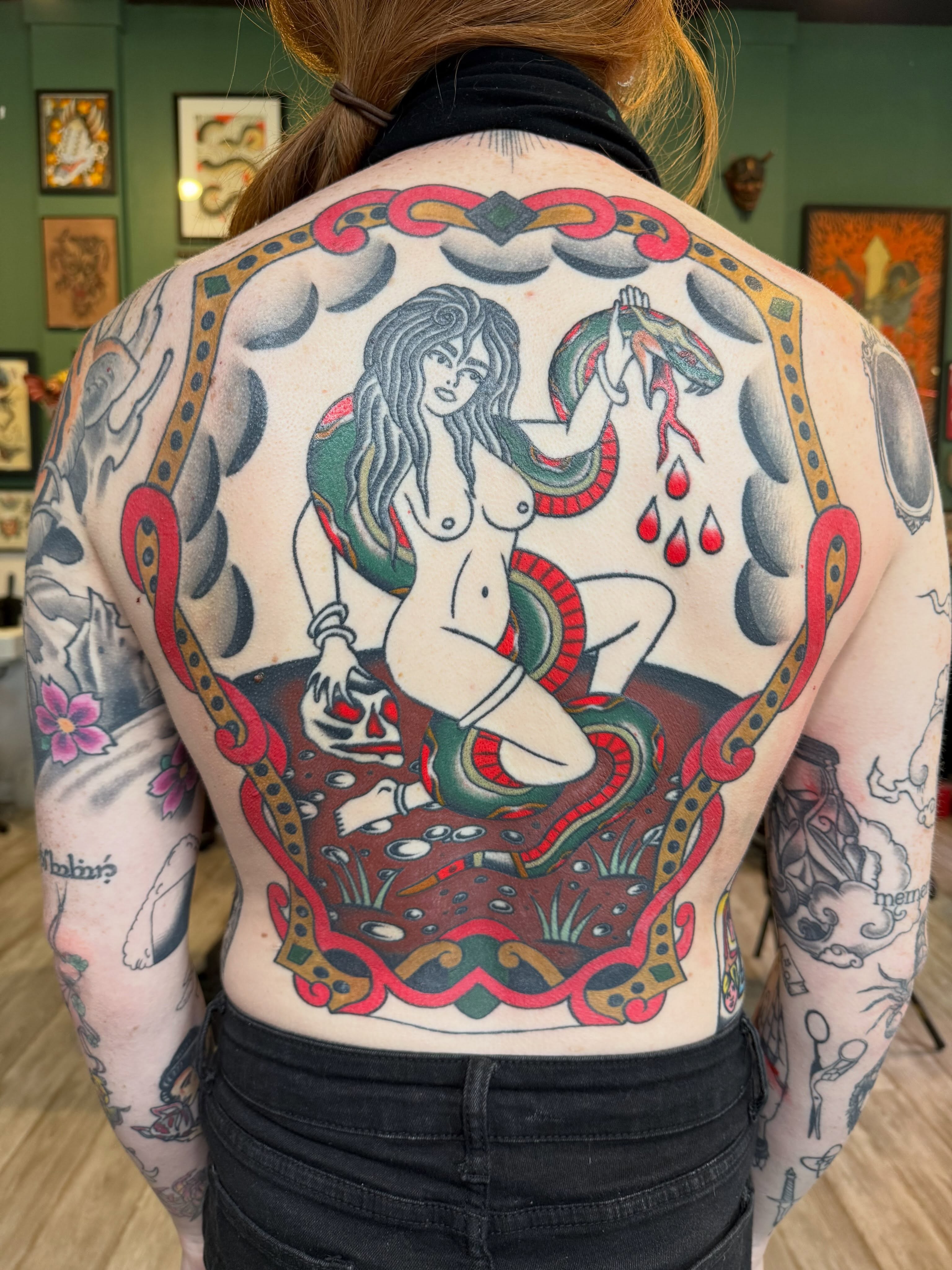 Serpent woman American traditional tattoo on the back by Collin Rigsby, Minneapolis, Minnesota