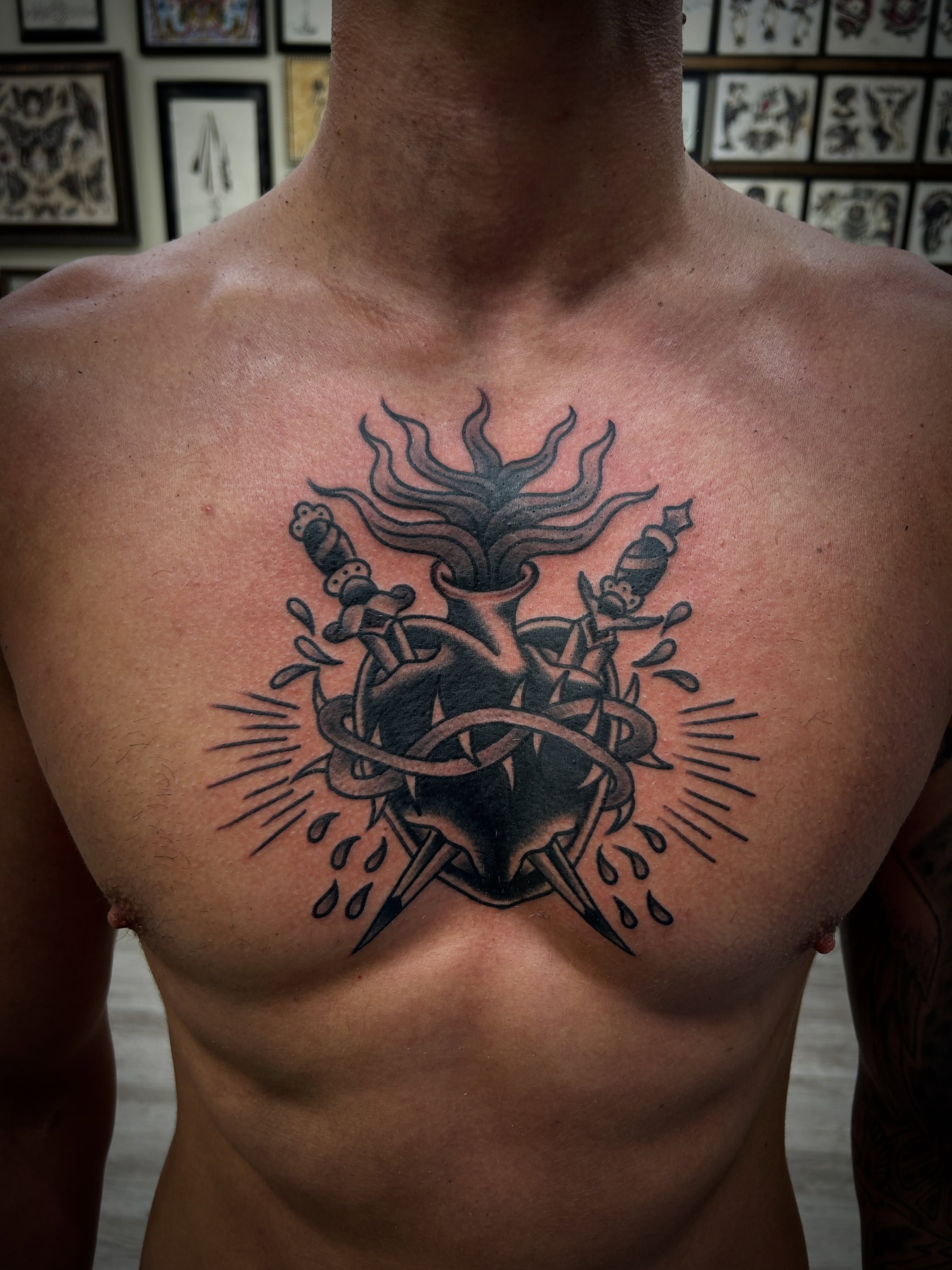 Heart with spikes neo-traditional tattoo on the chest by Eric Caudill, Indianapolis, Indiana