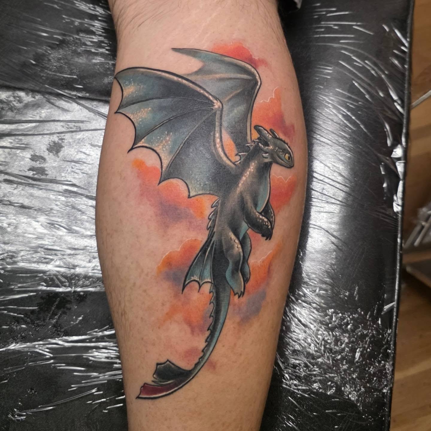 Dragon realism tattoo on the forearm by Kosta