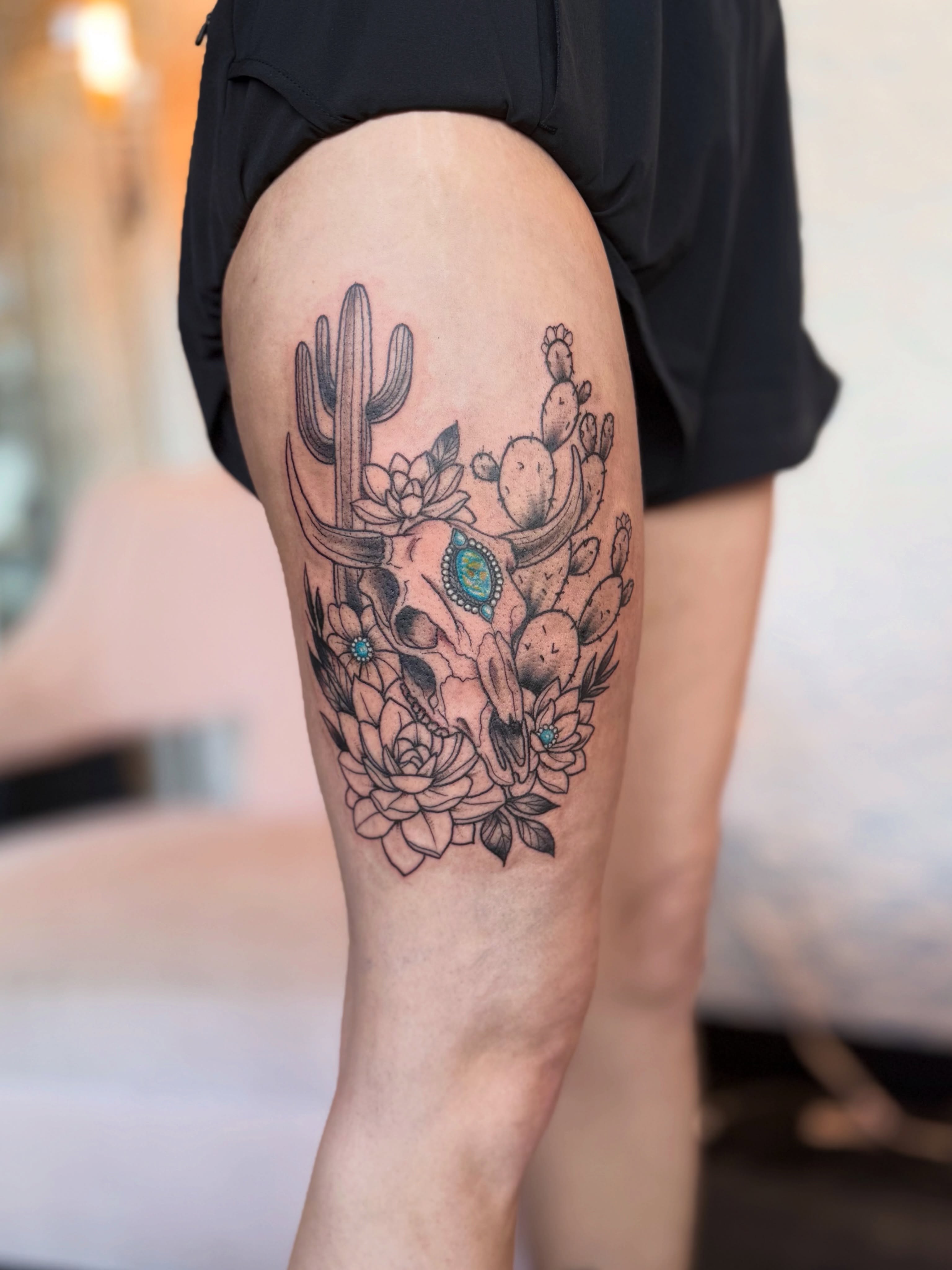 Cactus and succulents black and grey tattoo on the thigh by Kyndall Lynn, Waxahachie, Texas