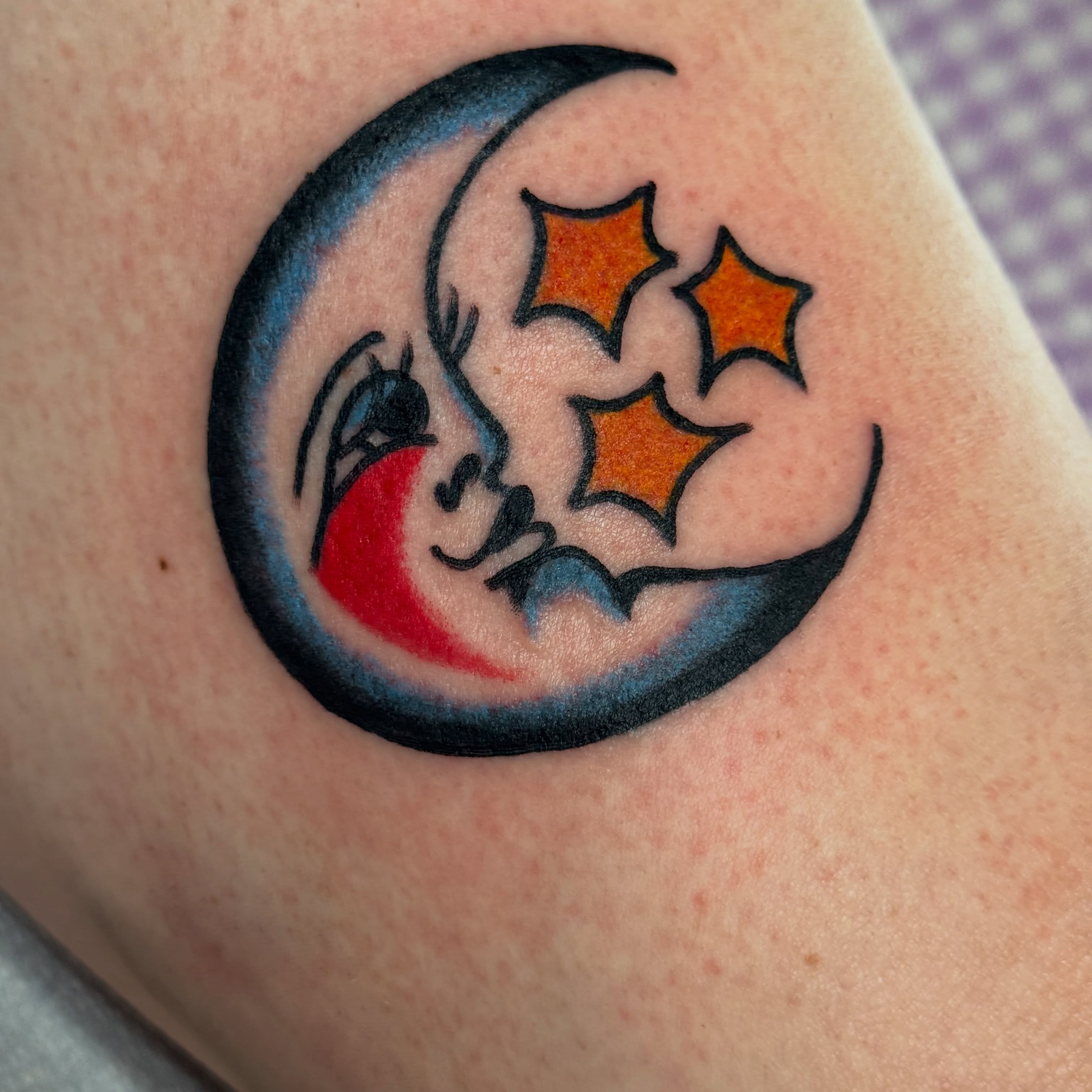 Moon and stars American traditional tattoo on the forearm by JoJo Benton