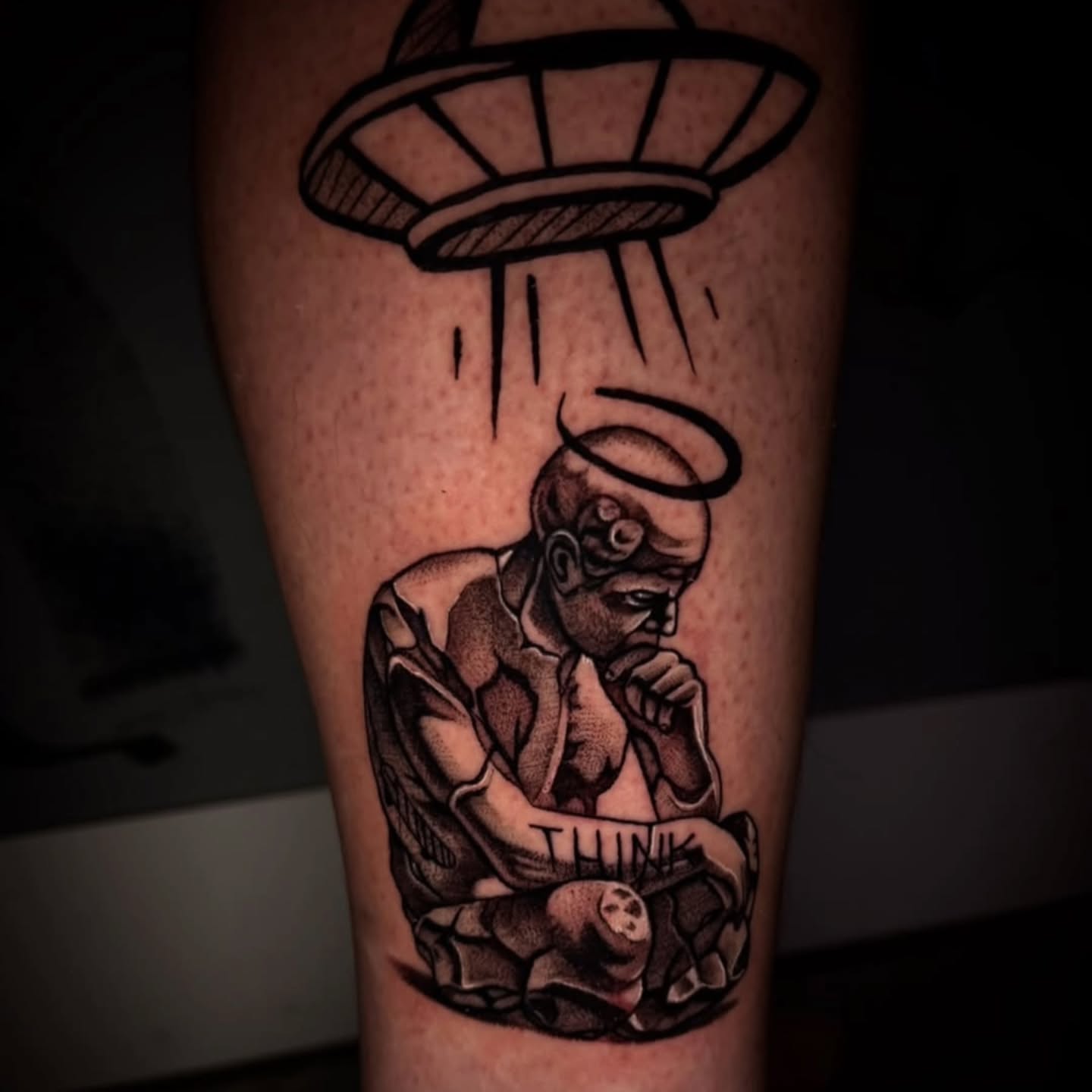 Alien abduction black and grey tattoo on the forearm by 𝕸 𝖆 𝖓 𝖔 𝖑 𝖔