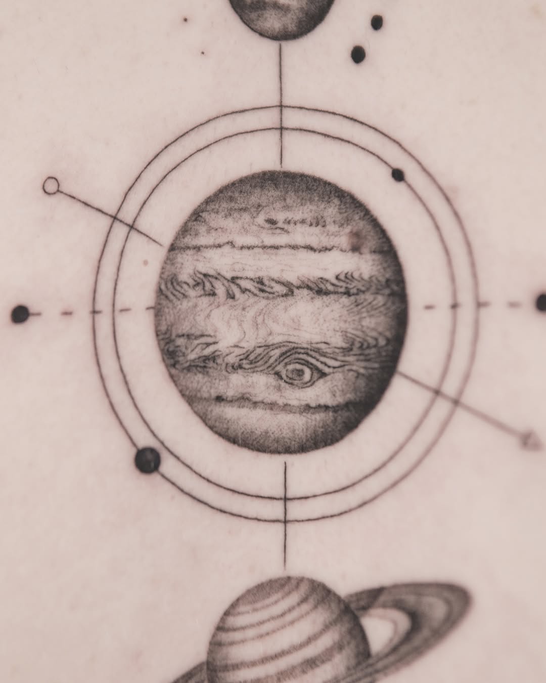 Planets and orbits geometric tattoo by Joey