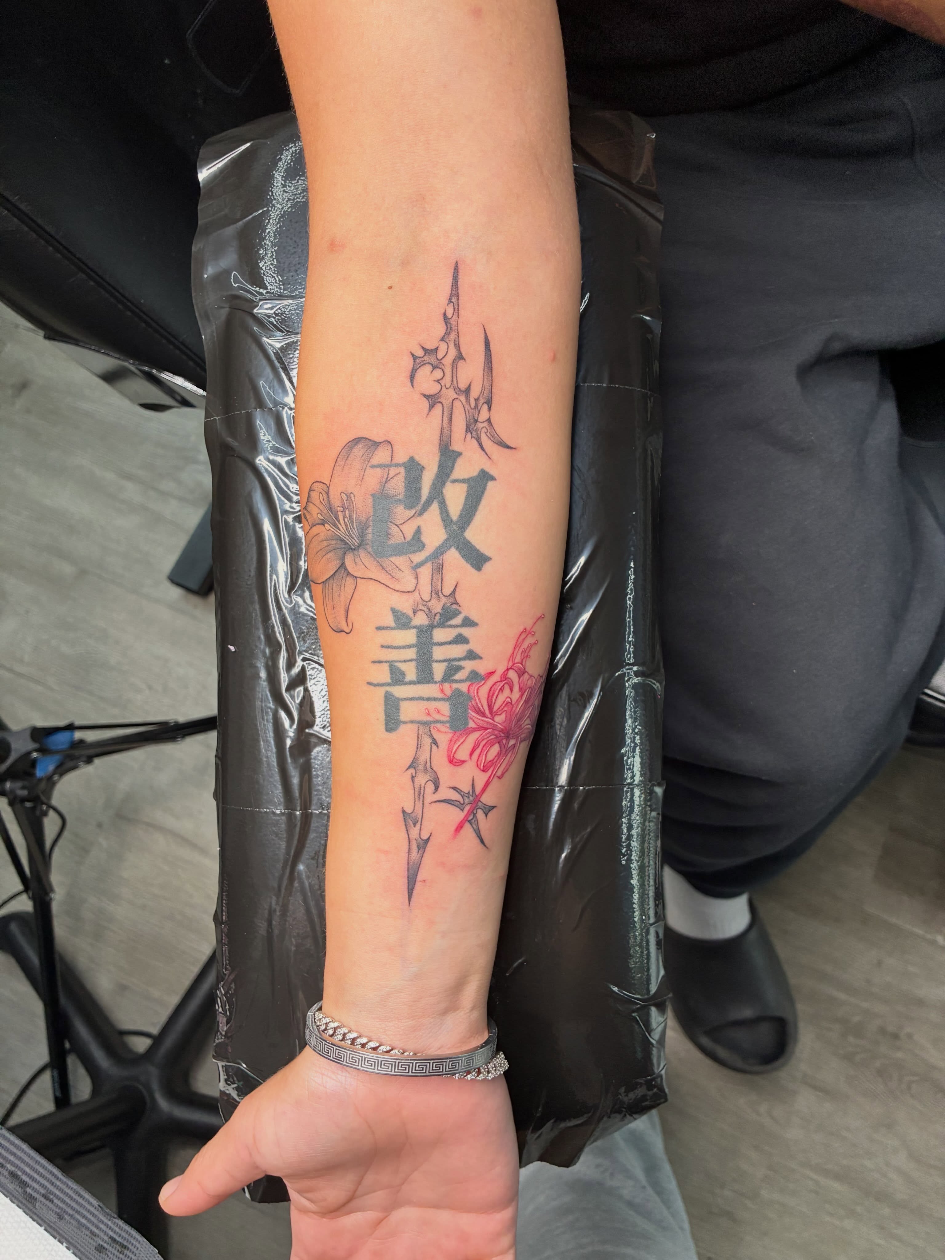 Cherry blossom and kanji japanese irezumi tattoo on the forearm by Tattoos by Hailey