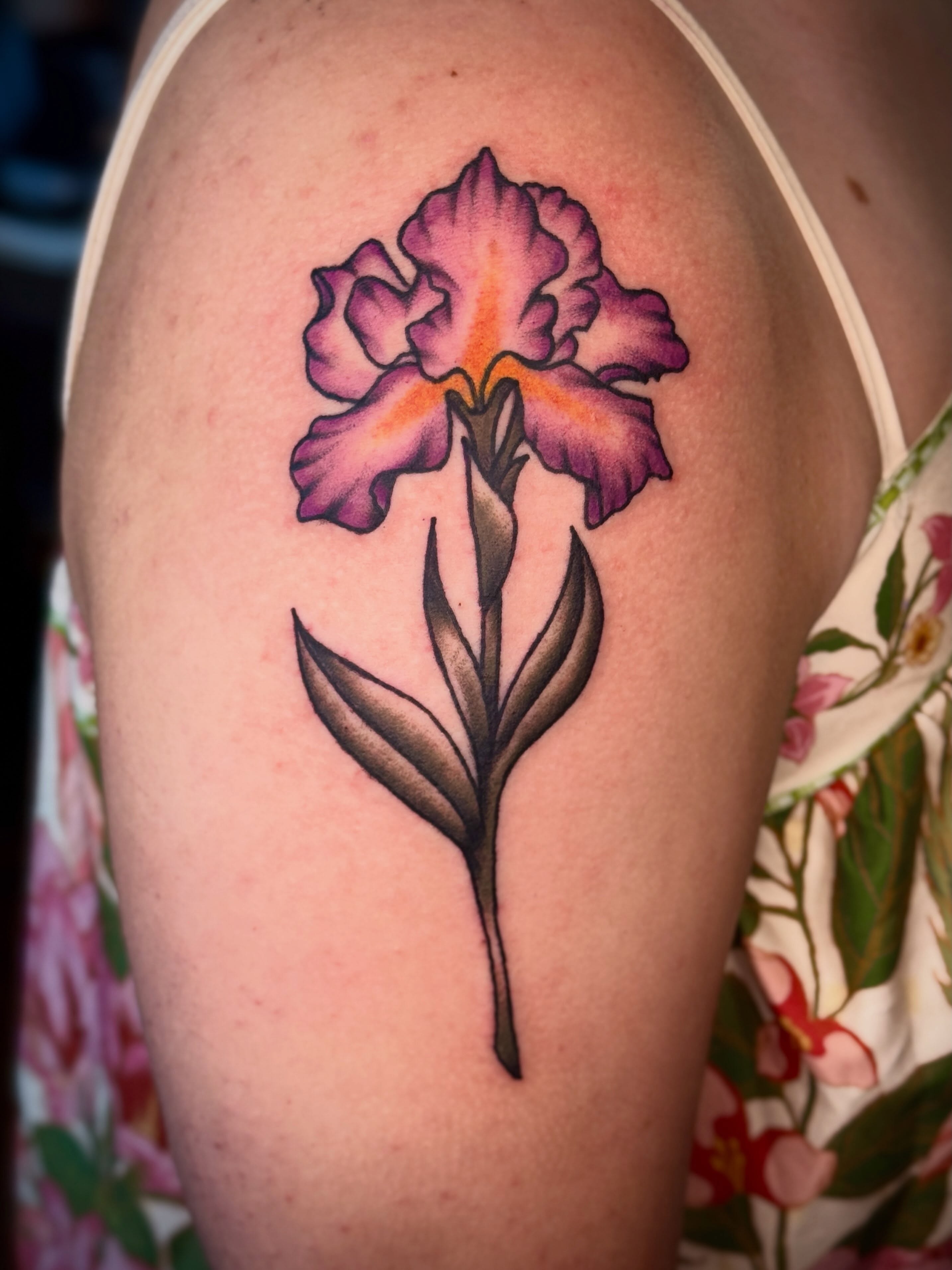 Iris realism tattoo on the shoulder by Meg Nefcy, Milford, Michigan