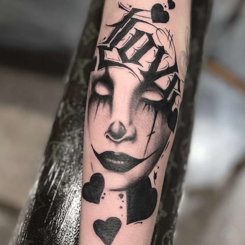 Woman's face realism tattoo on the forearm by Matthew Crawley