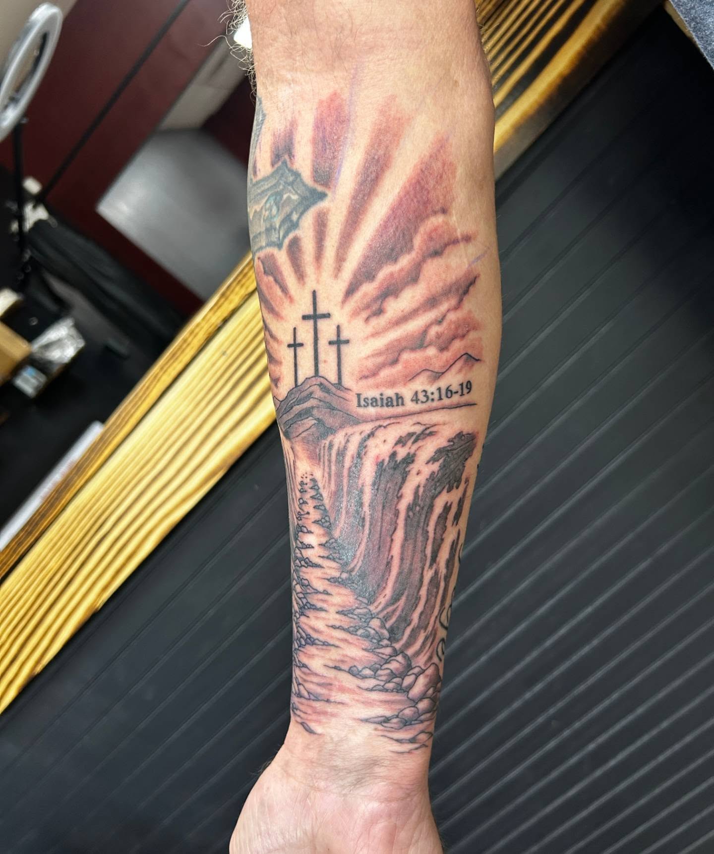 Religious landscape realism tattoo on the forearm by Abby Camacho - Tattoo Artist and Piercer โจ๐