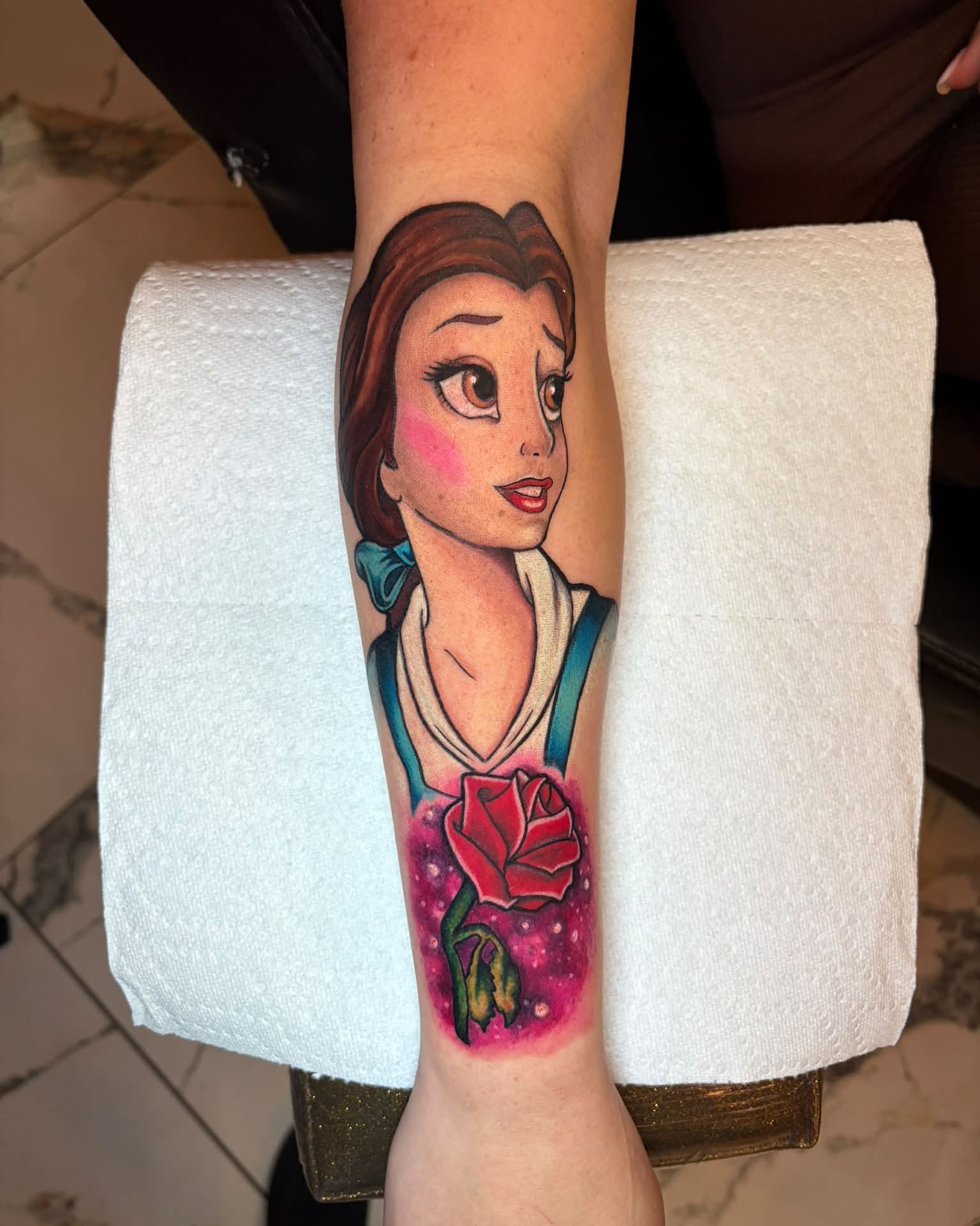Belle realism tattoo on the forearm by Rachel Sellers