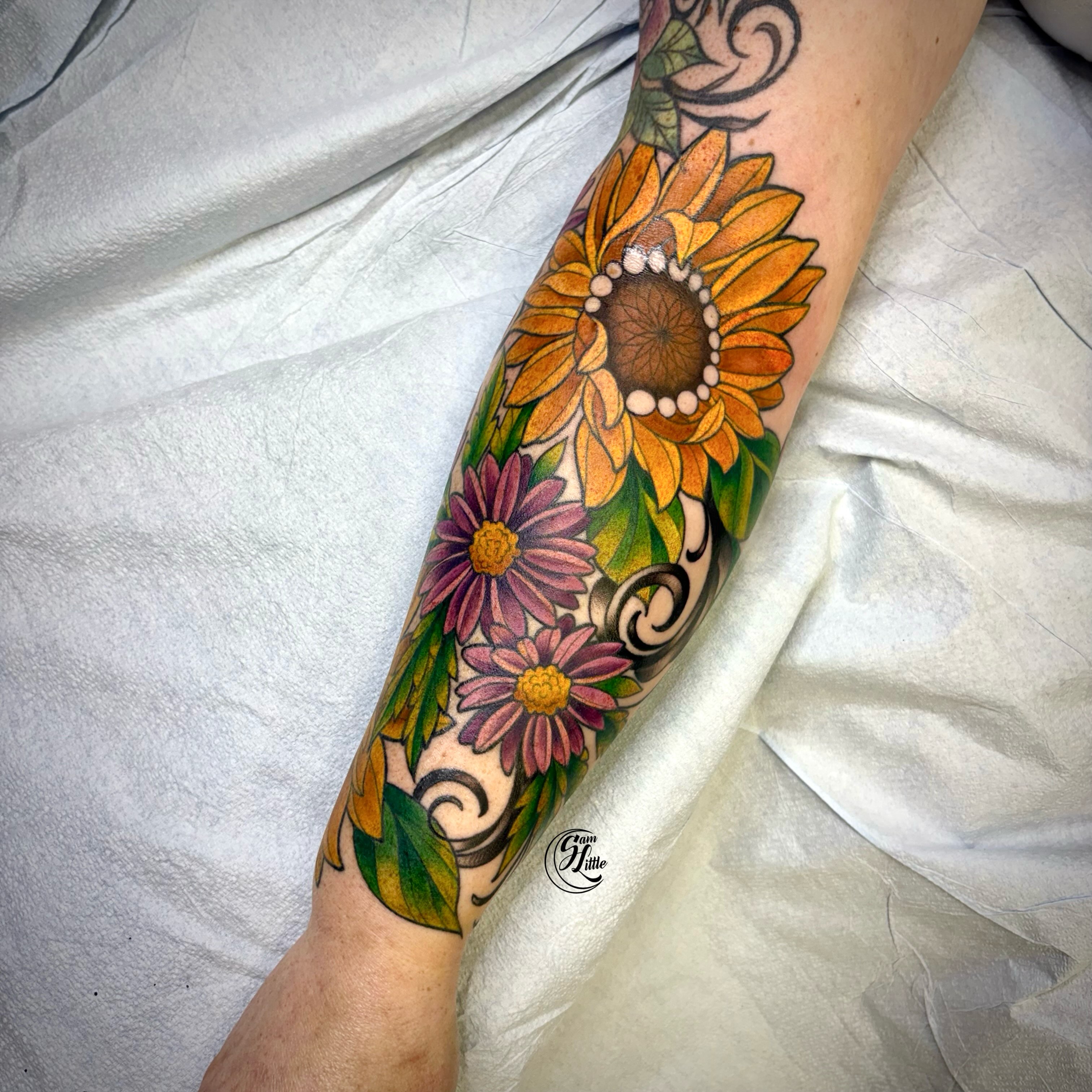 Sunflowers and daisies dotwork tattoo on the forearm by 𝓢𝓪𝓶 𝓛𝓲𝓽𝓽𝓵𝓮