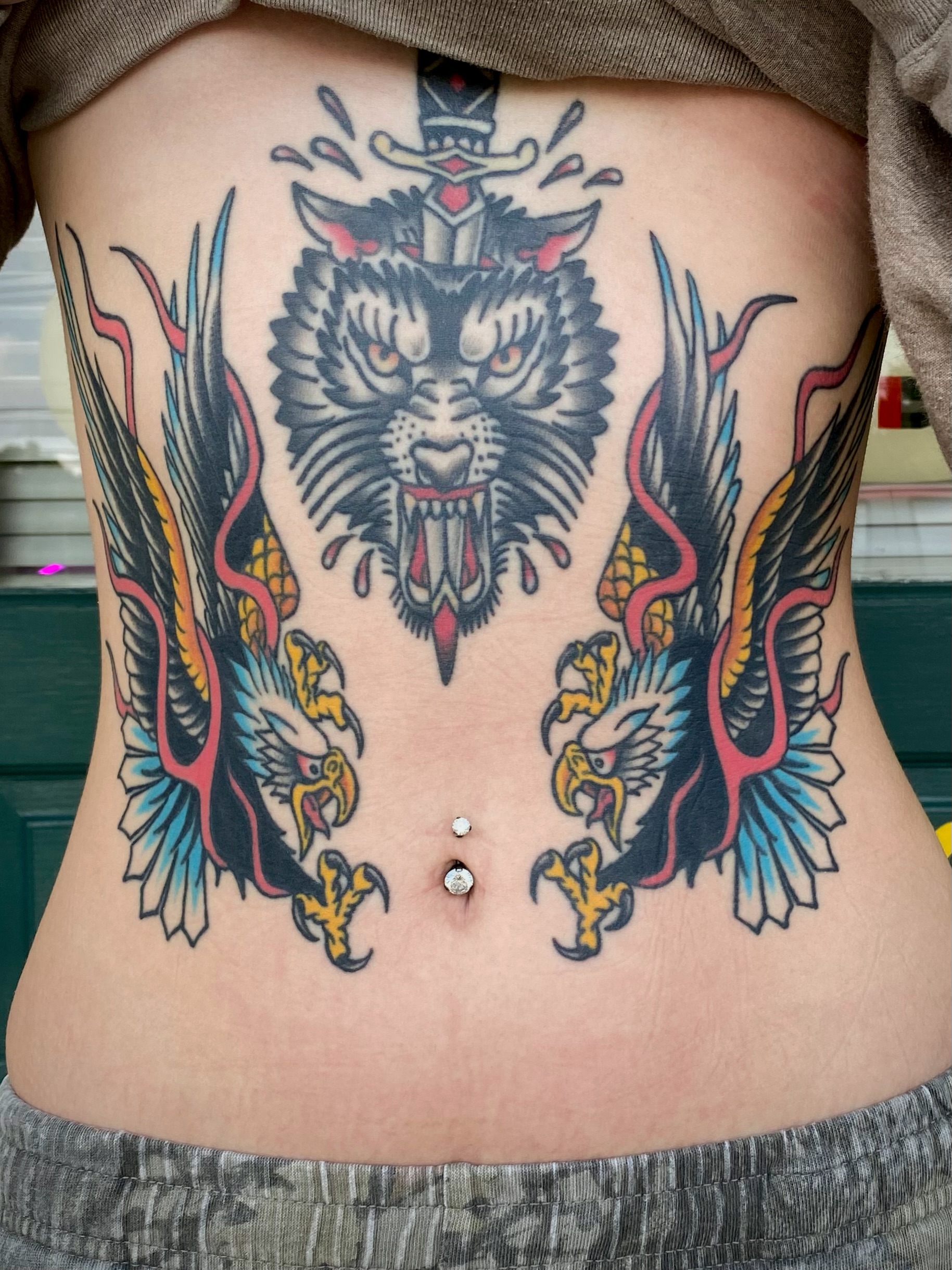 Wolf and eagles American traditional tattoo on the torso by Jack, Knoxville, Tennessee