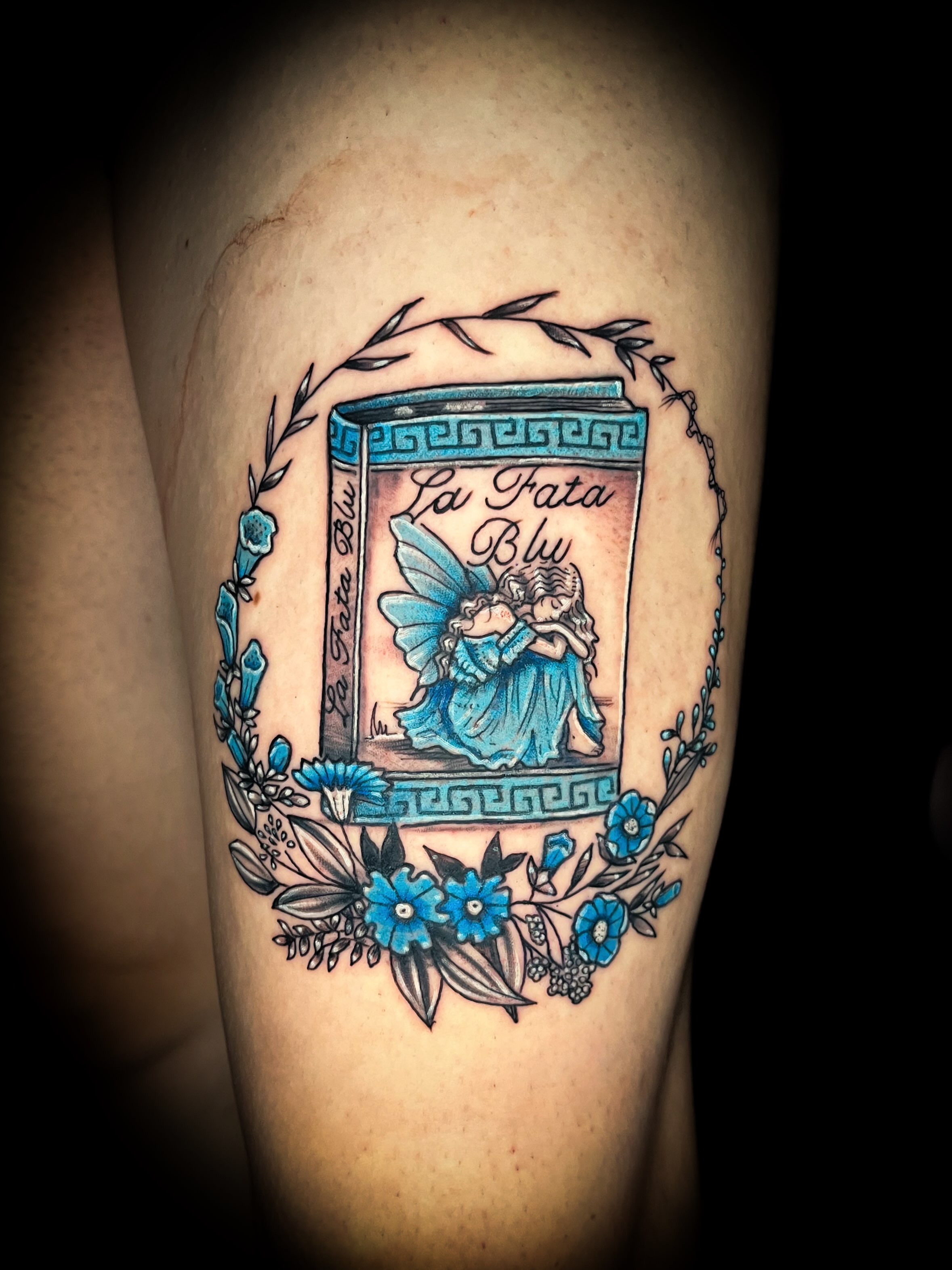 Fairy couple illustrative tattoo on the forearm by Lindsay Fernandez, Colorado Springs, Colorado