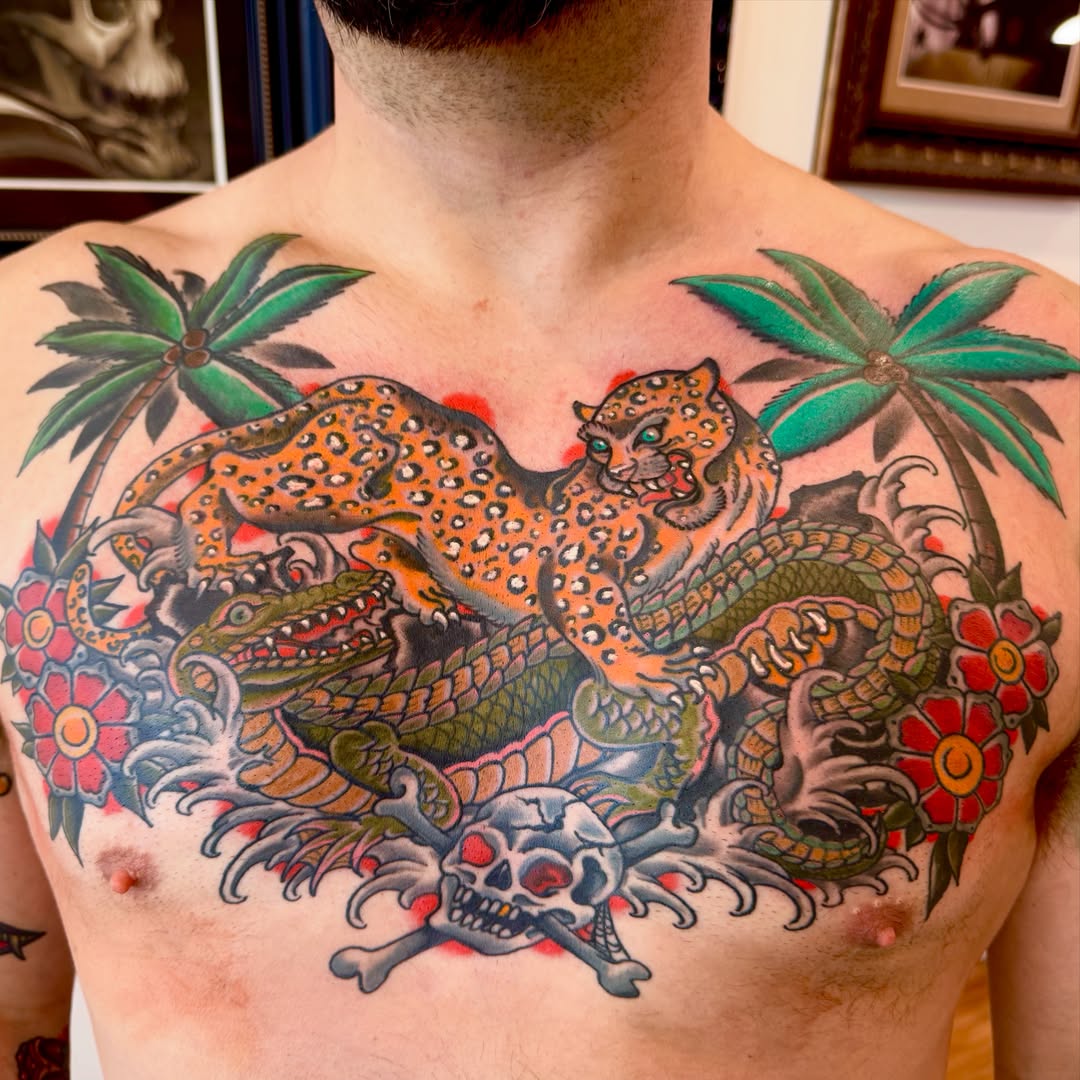Jaguar and dragon American traditional tattoo on the chest by Brian DiCola Tattooer