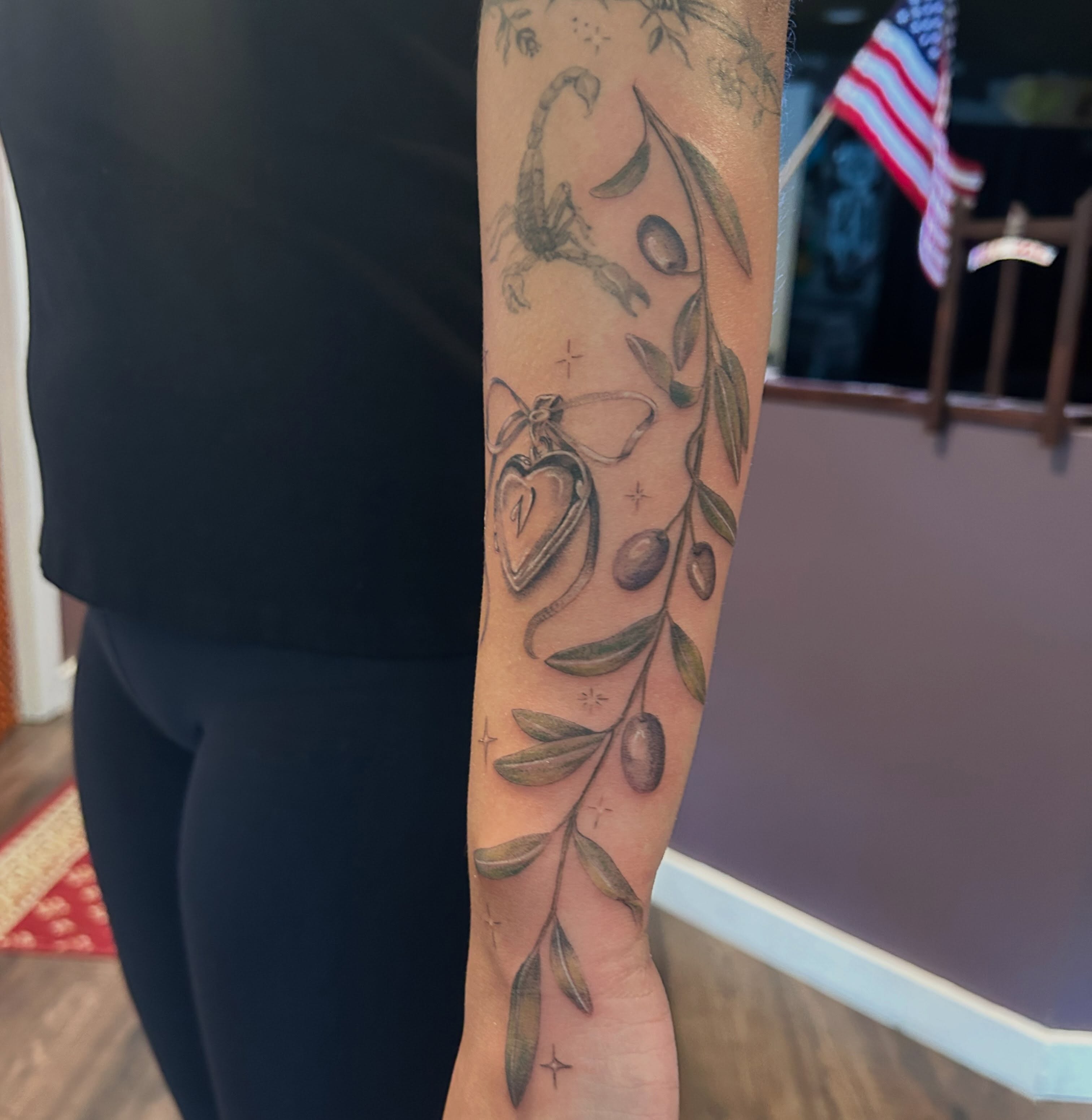 Olive branch and heart black and grey tattoo on the forearm by Elizabeth (Lib), Murfreesboro, Tennessee