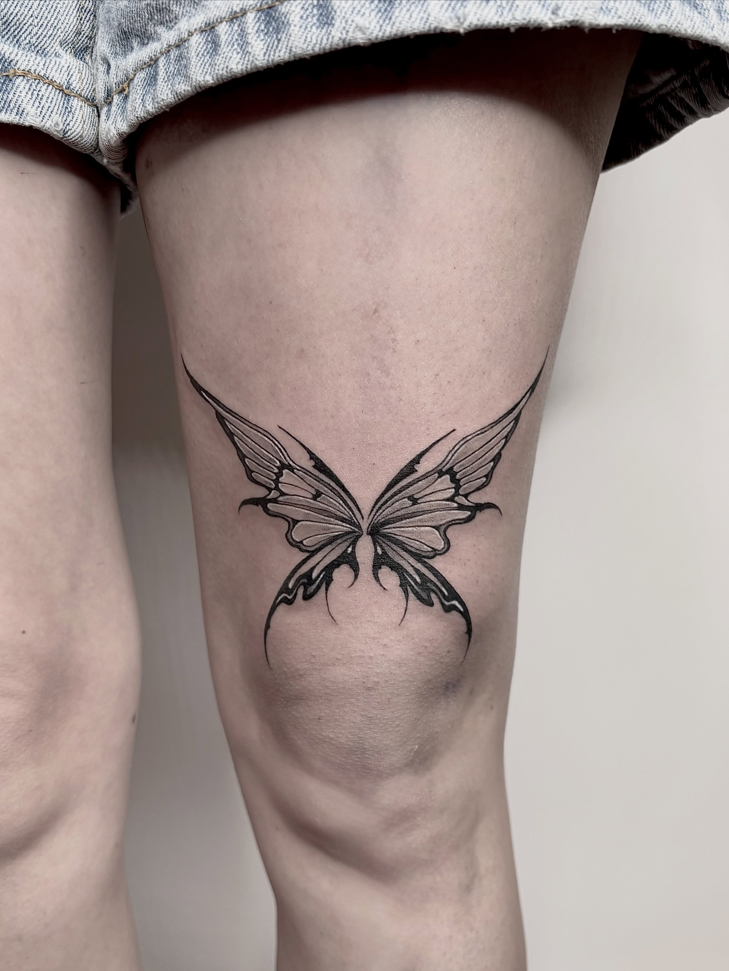 Butterfly black and grey tattoo on the thigh by <3 eve’s tattoos <3