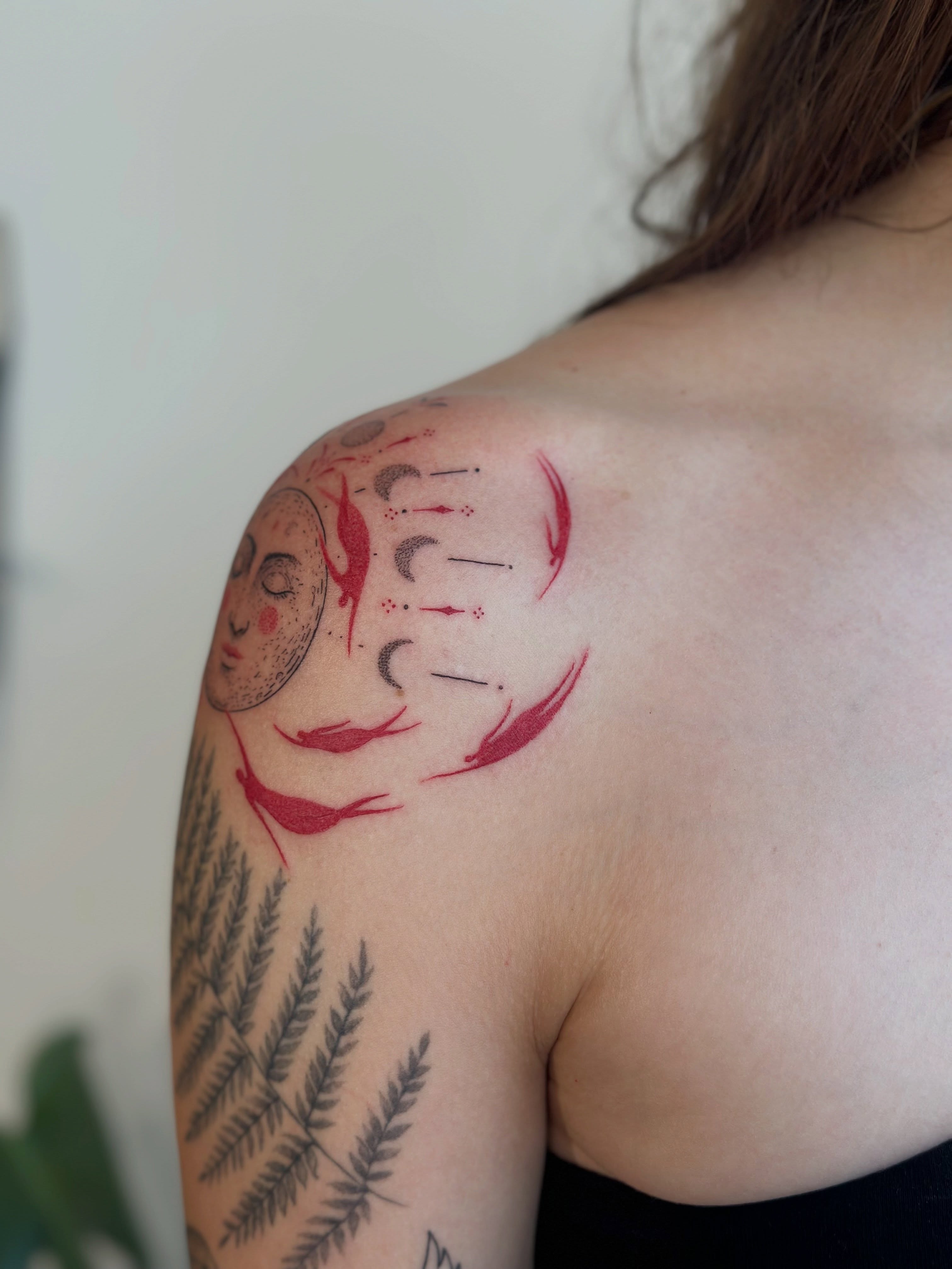 Moon phases dotwork tattoo on the shoulder by Santiago Don, Portland, Oregon