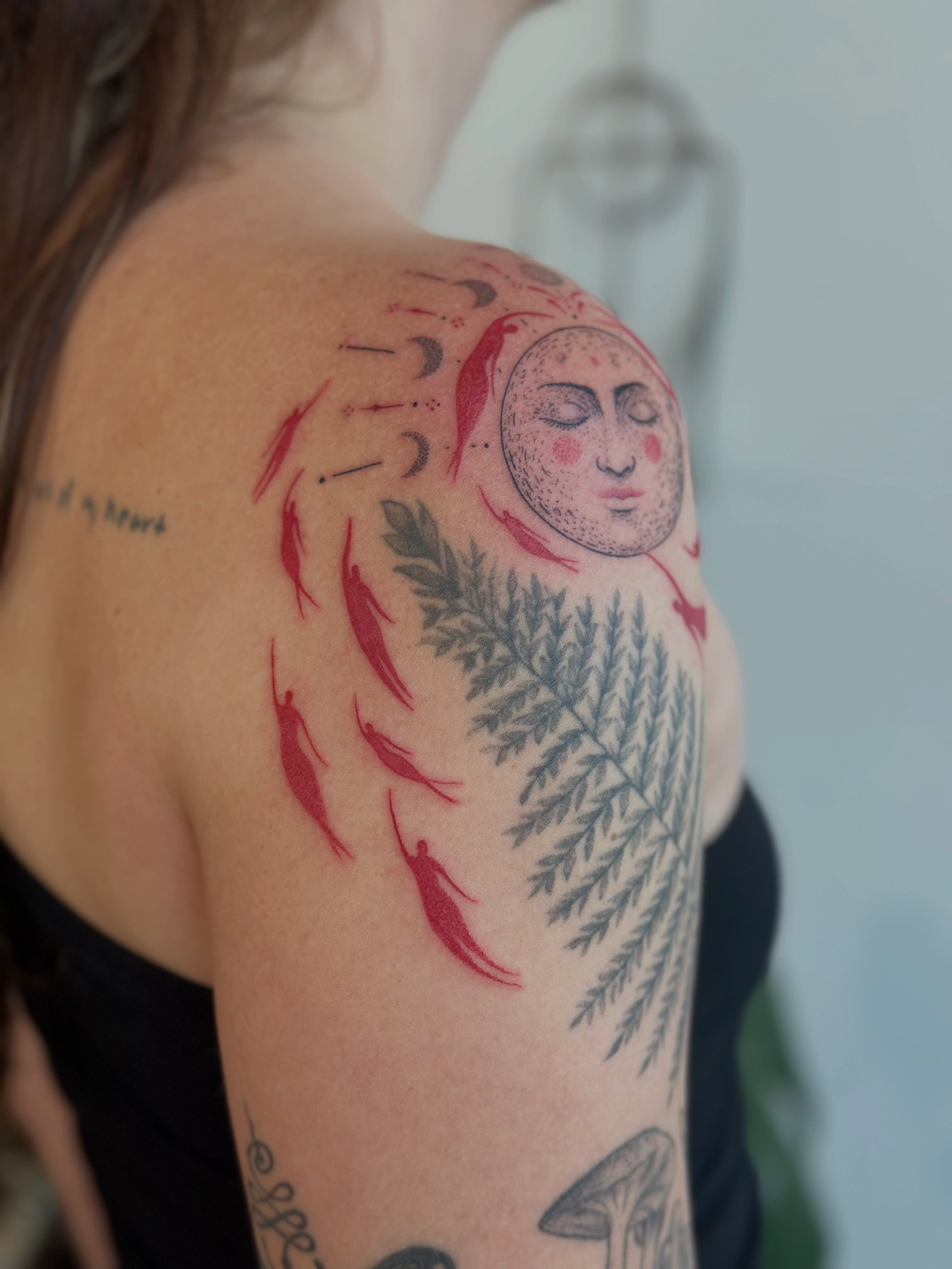 Moon and fern dotwork tattoo on the shoulder by Santiago Don, Portland, Oregon
