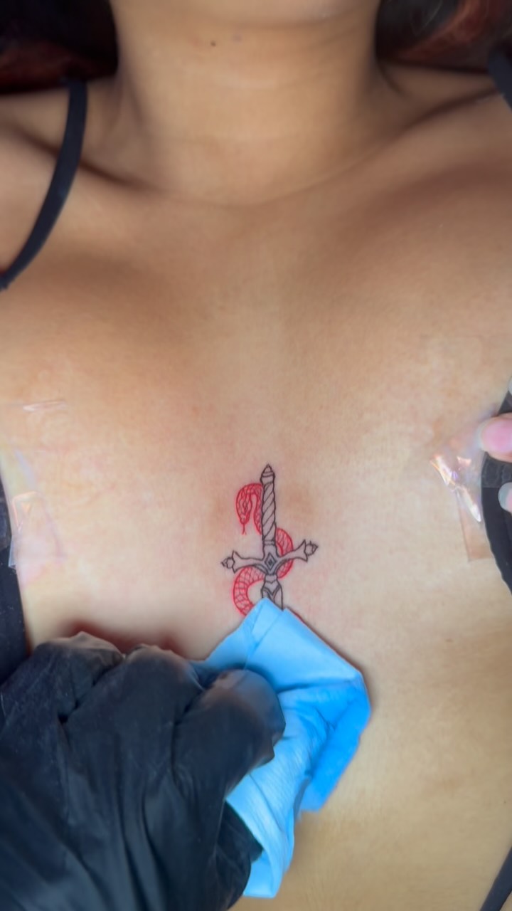 Dagger and snake fine line tattoo by Kelsoink