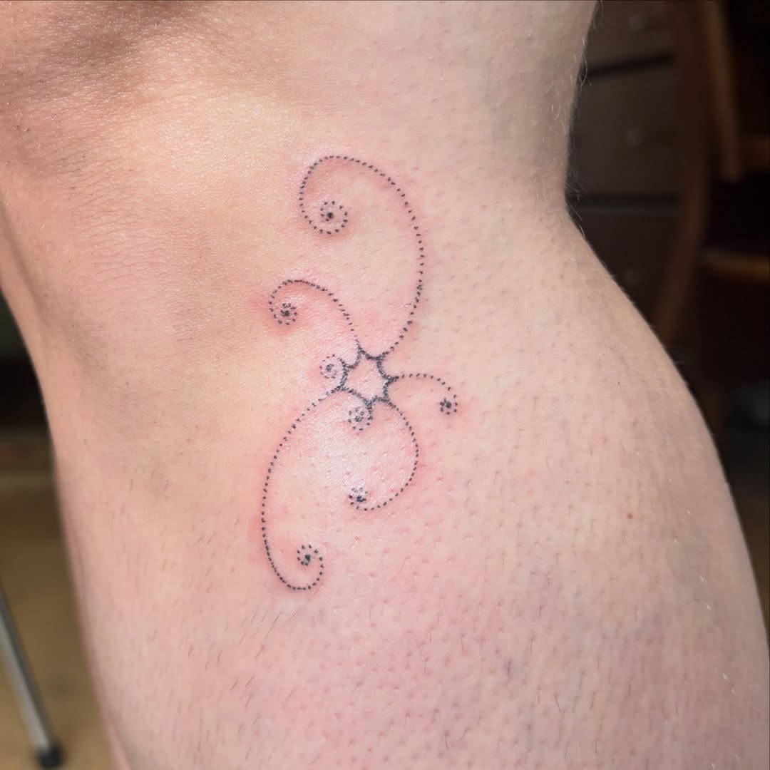 Dotwork swirls dotwork tattoo on the thigh by kari