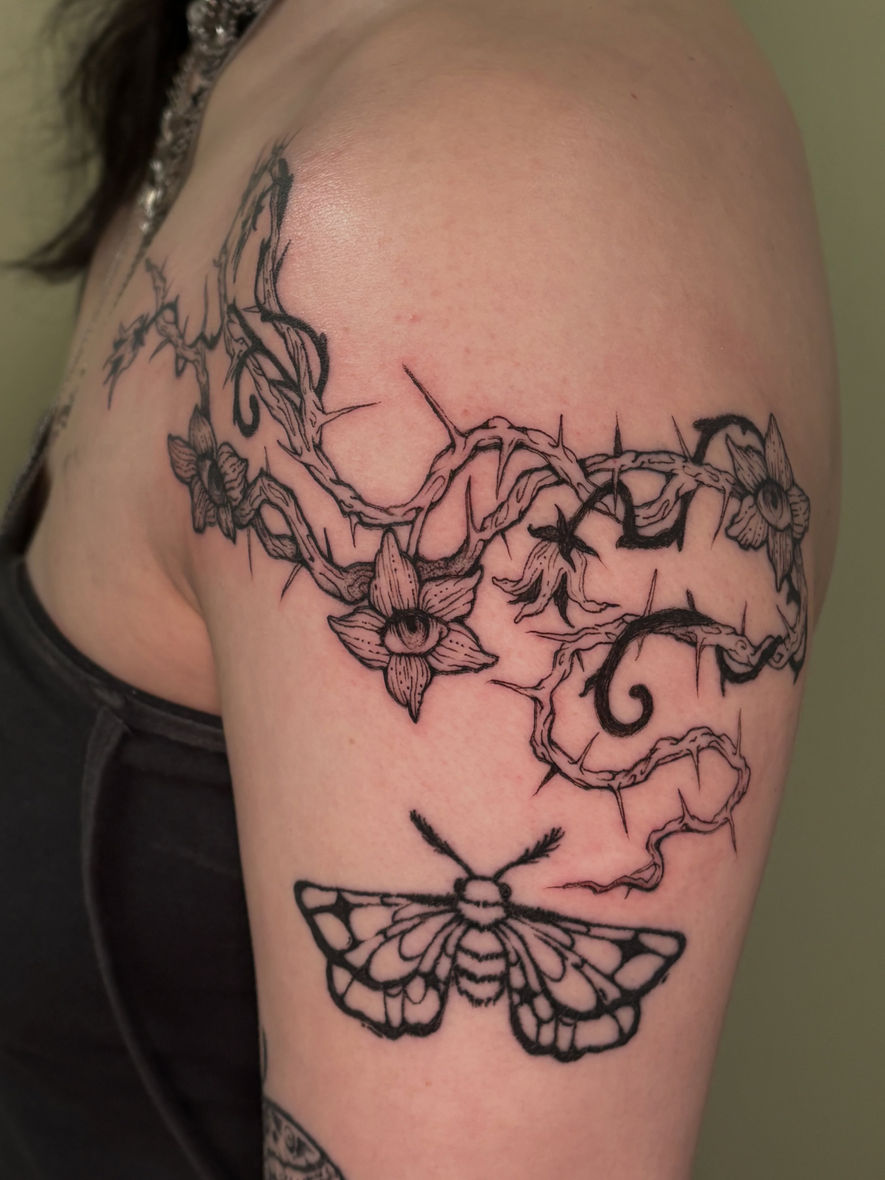 Thorn vine moth realism tattoo on the shoulder by Chloe Shay