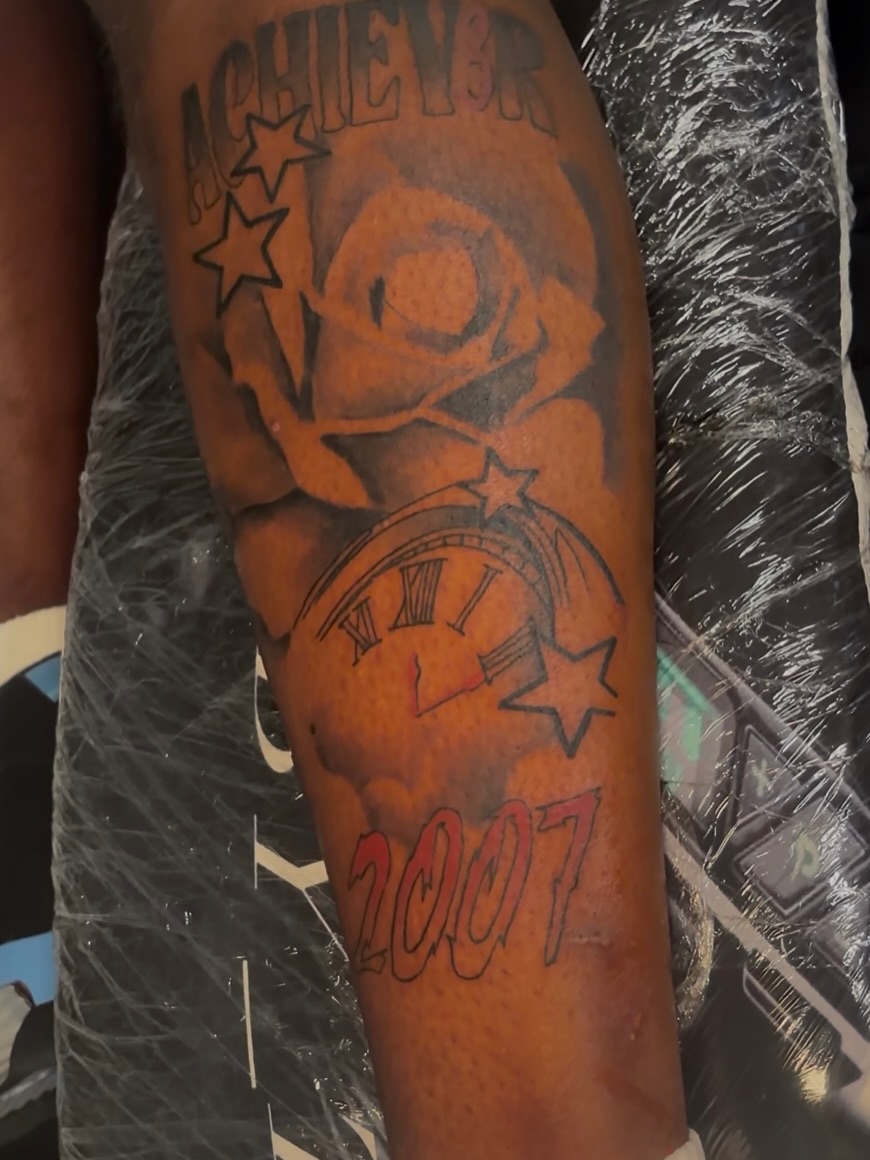 Rose and clock American traditional tattoo on the forearm by Female Cleveland Tat Artist ๐