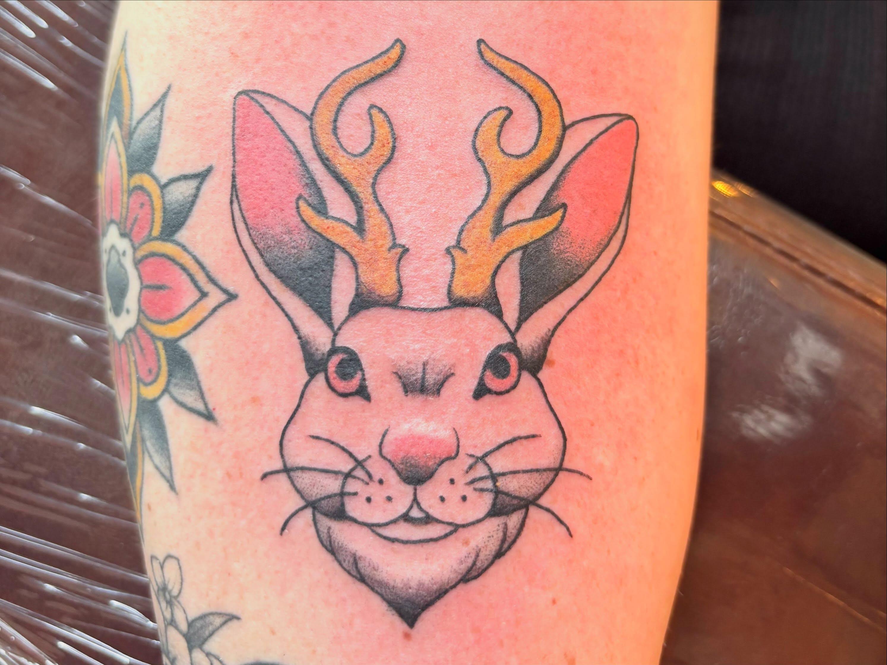 Rabbit with antlers American traditional tattoo on the forearm by Leah Leinani