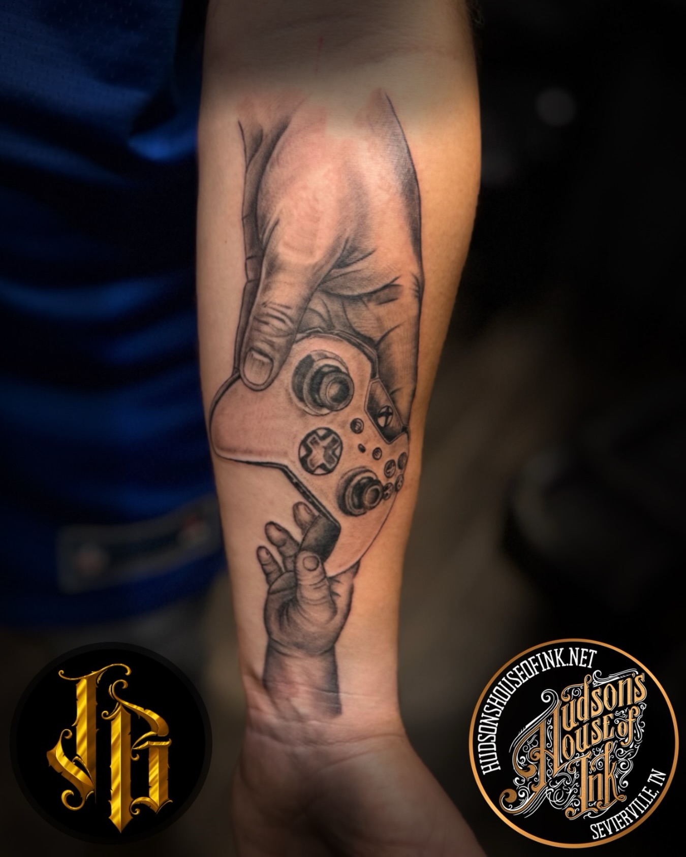 Video game controller realism tattoo on the forearm by James Brooks