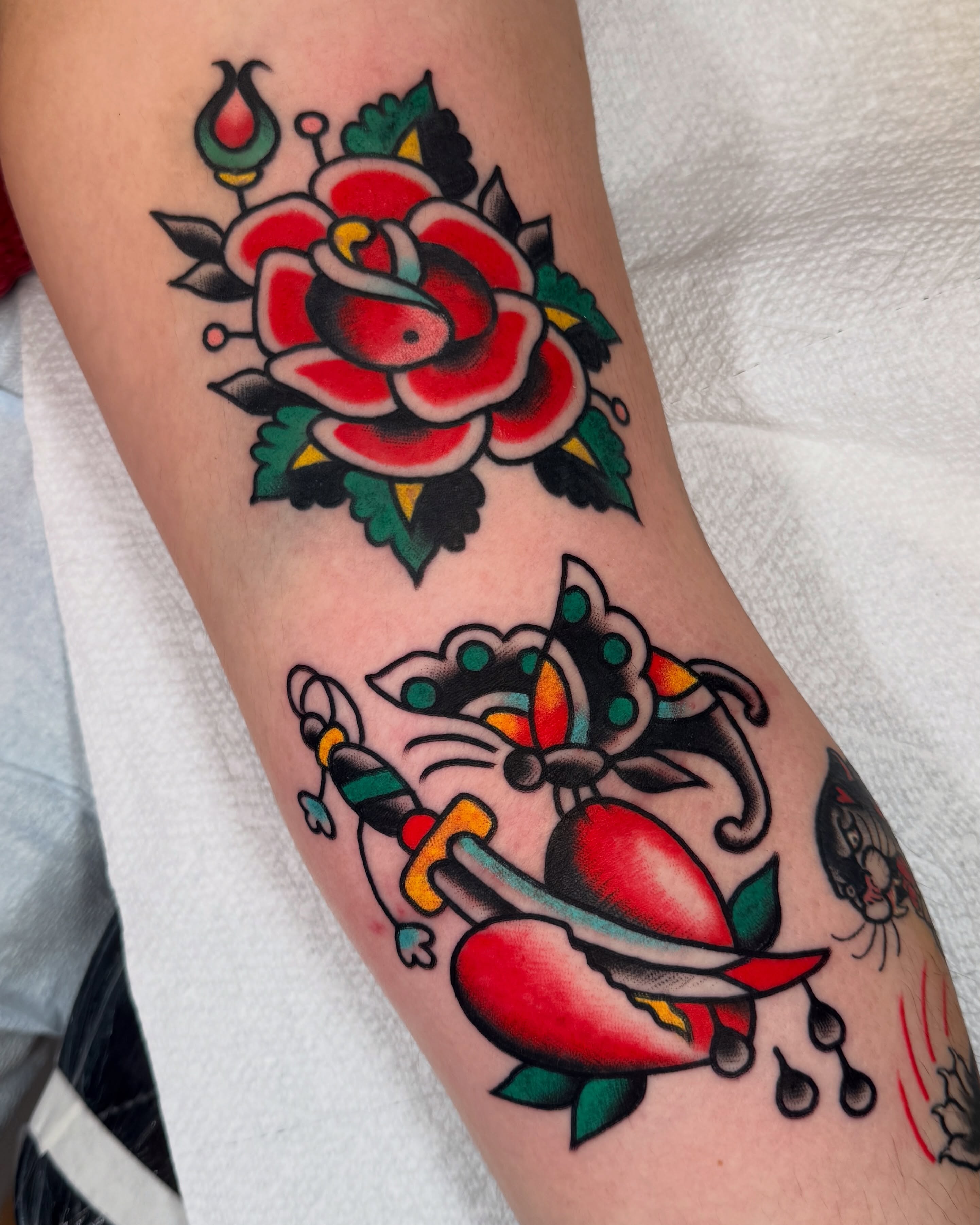 Rose and dagger American traditional tattoo on the forearm by Cullen Bleser Quinn