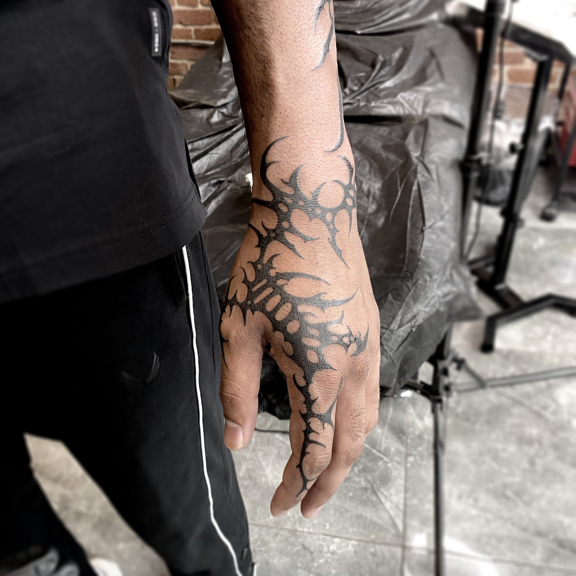 Scorpion tribal tattoo on the hand by R o s e