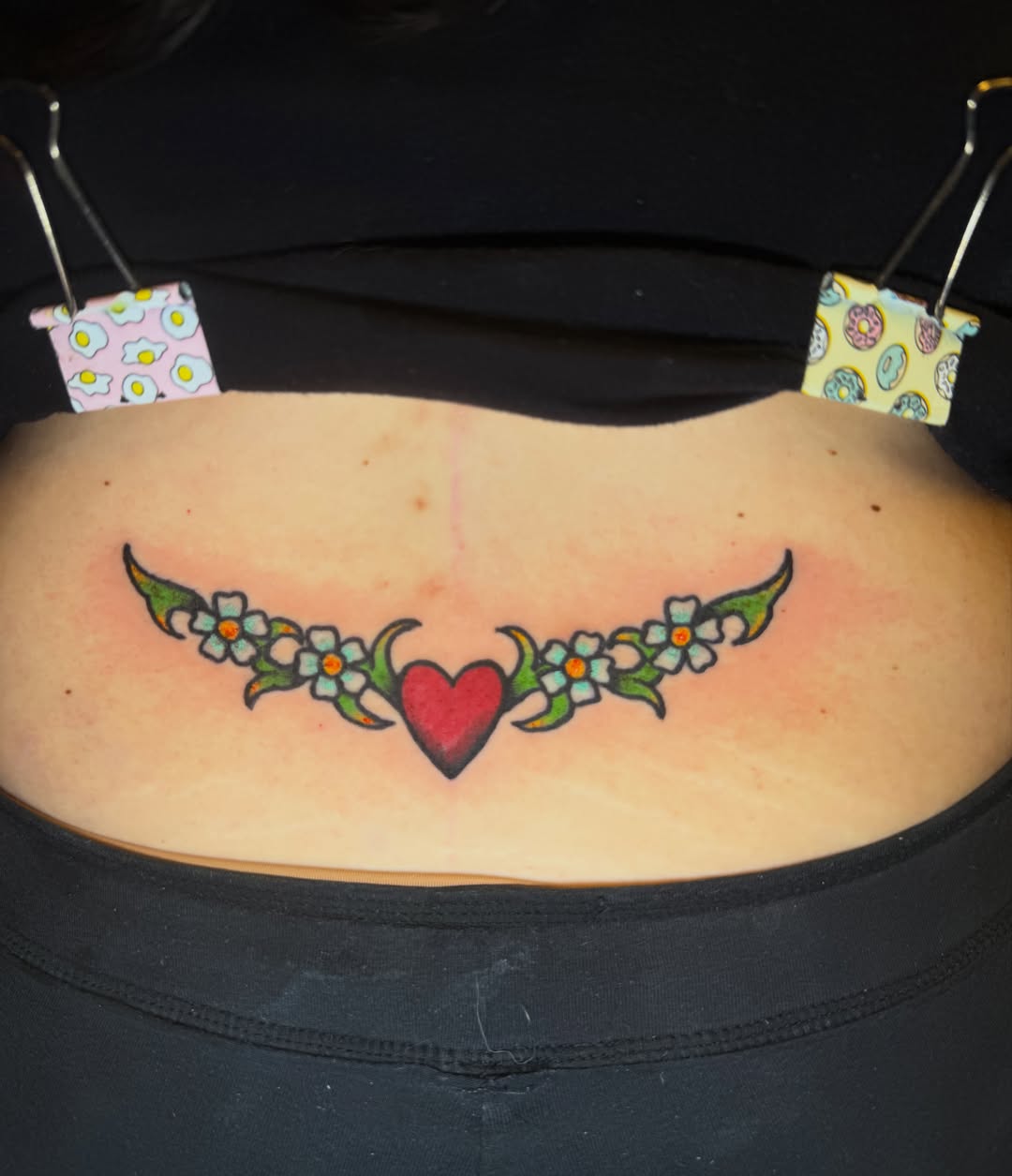 Heart with floral wings American traditional tattoo on the torso by Maggie De La Torre ๐ณ๏ธโโง๏ธ๐ฒ๐ฝ