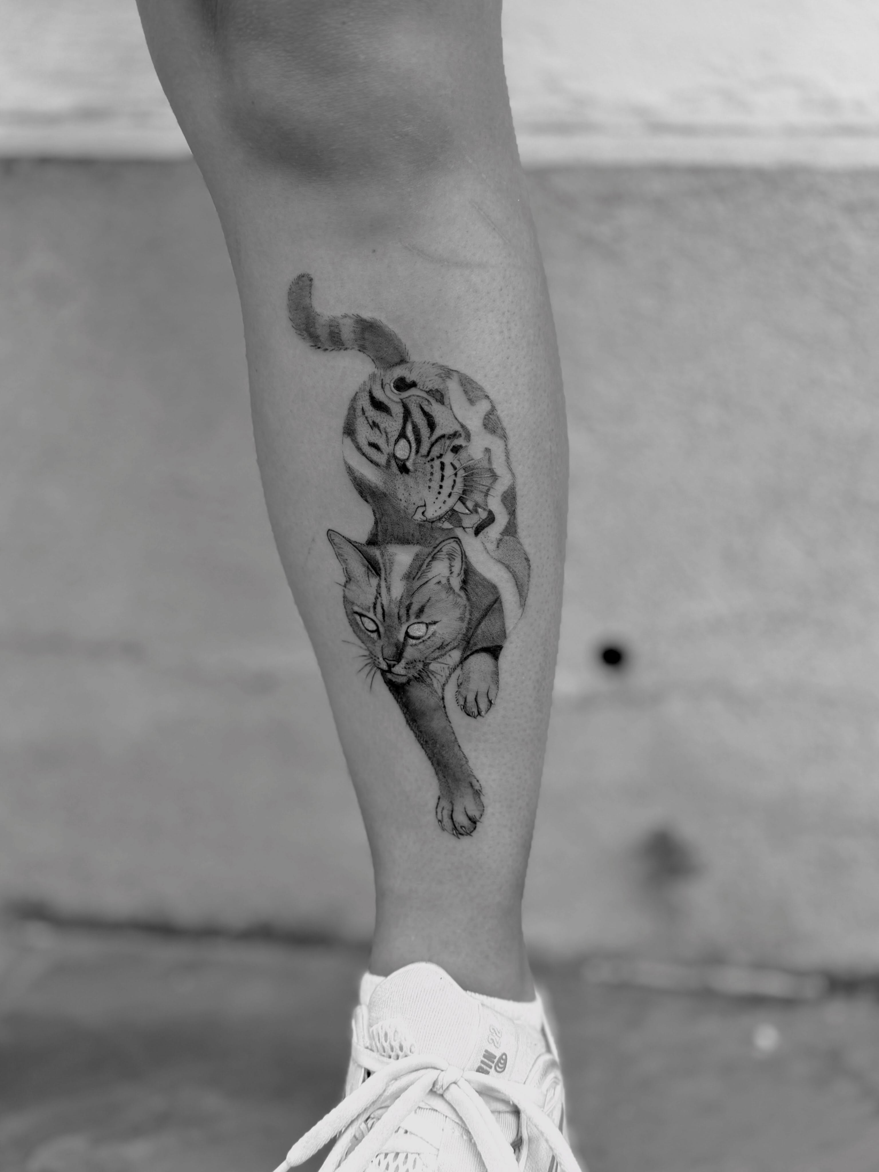 Cat realism tattoo on the forearm by Raleigh tattoo artist, Raleigh, North Carolina