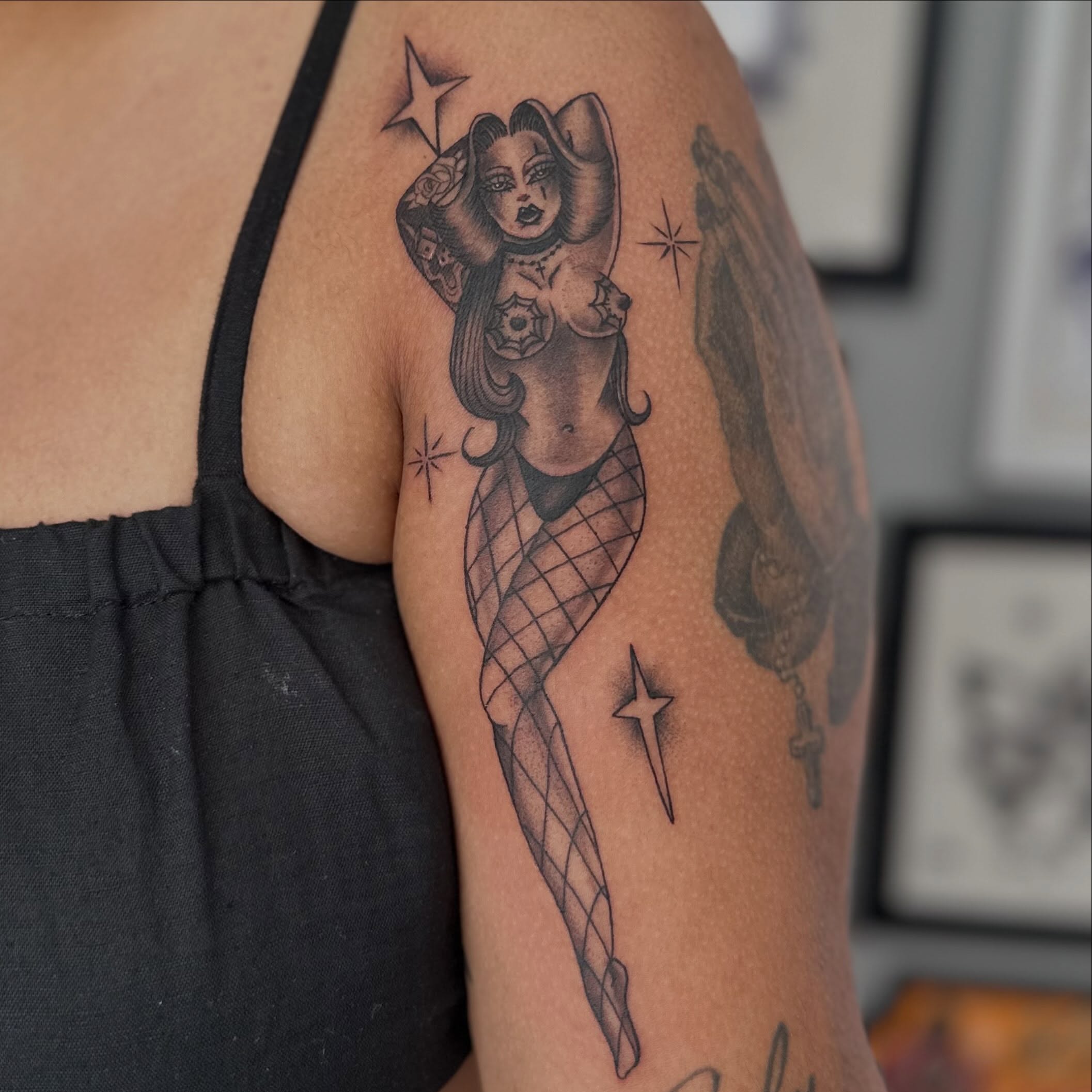 Mermaid American traditional tattoo on the upper arm by H e I D I