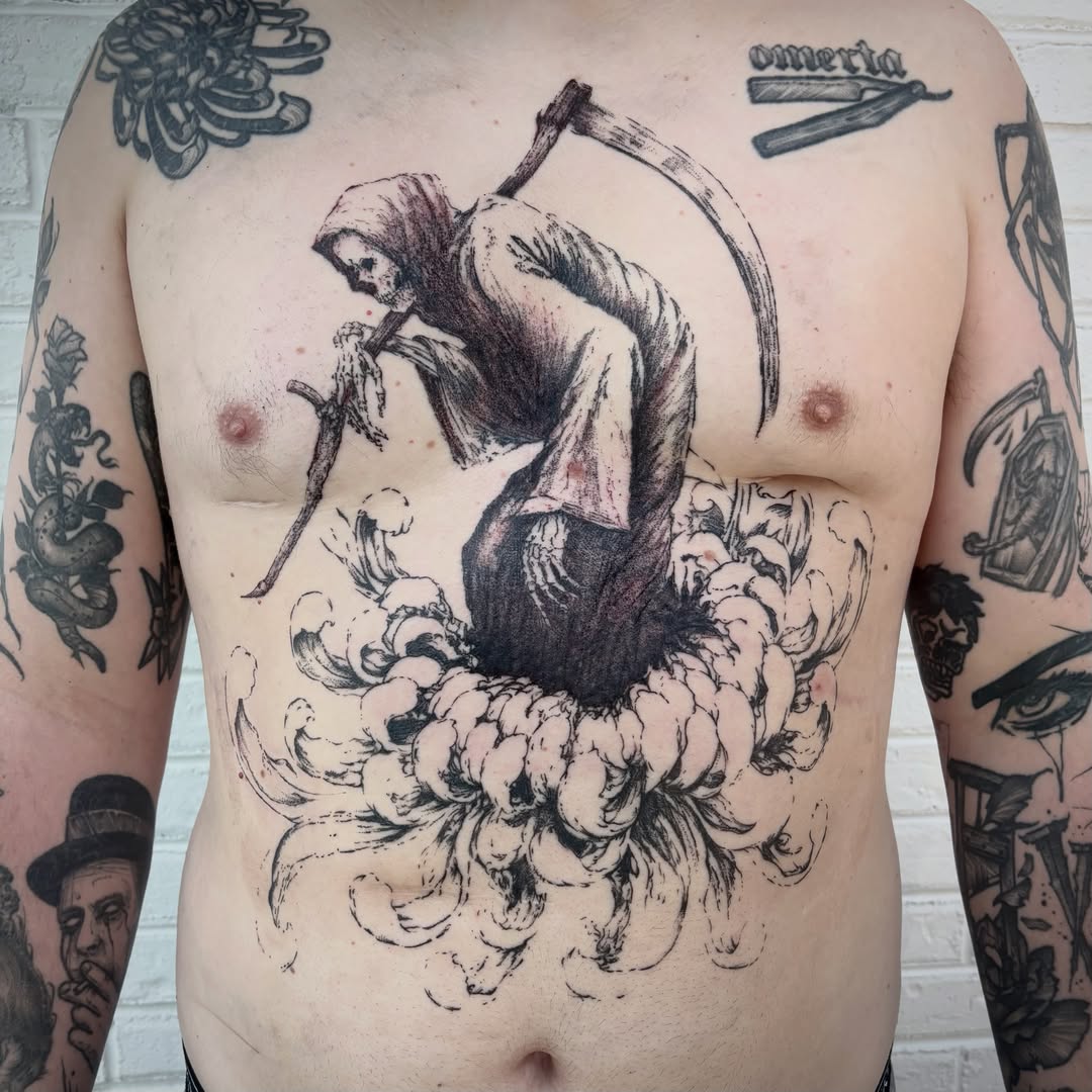 Grim reaper black and grey tattoo on the chest by unknown liquids tattoo