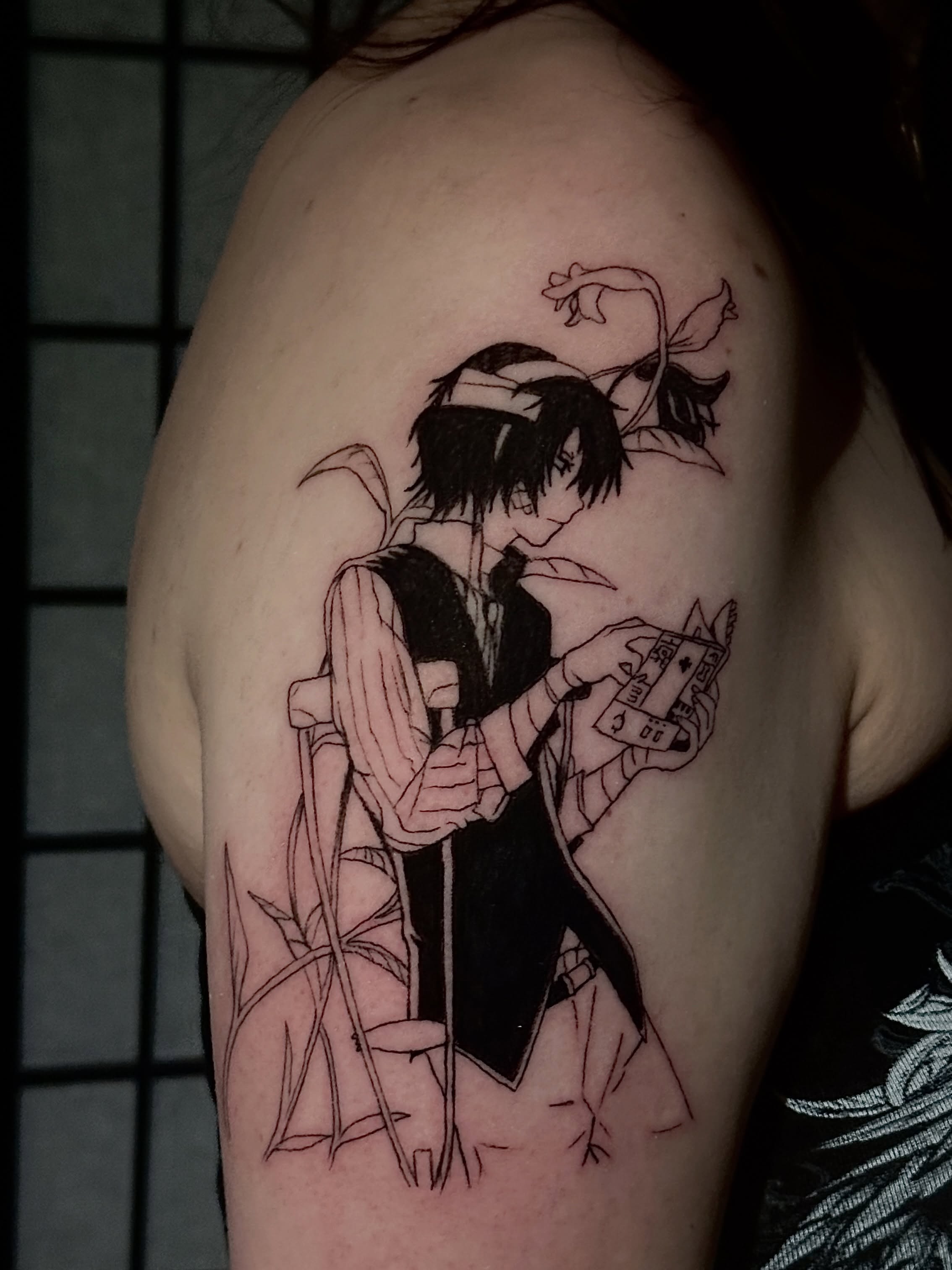 Anime character anime tattoo on the shoulder by Chris Whittaker Tattoo Artist